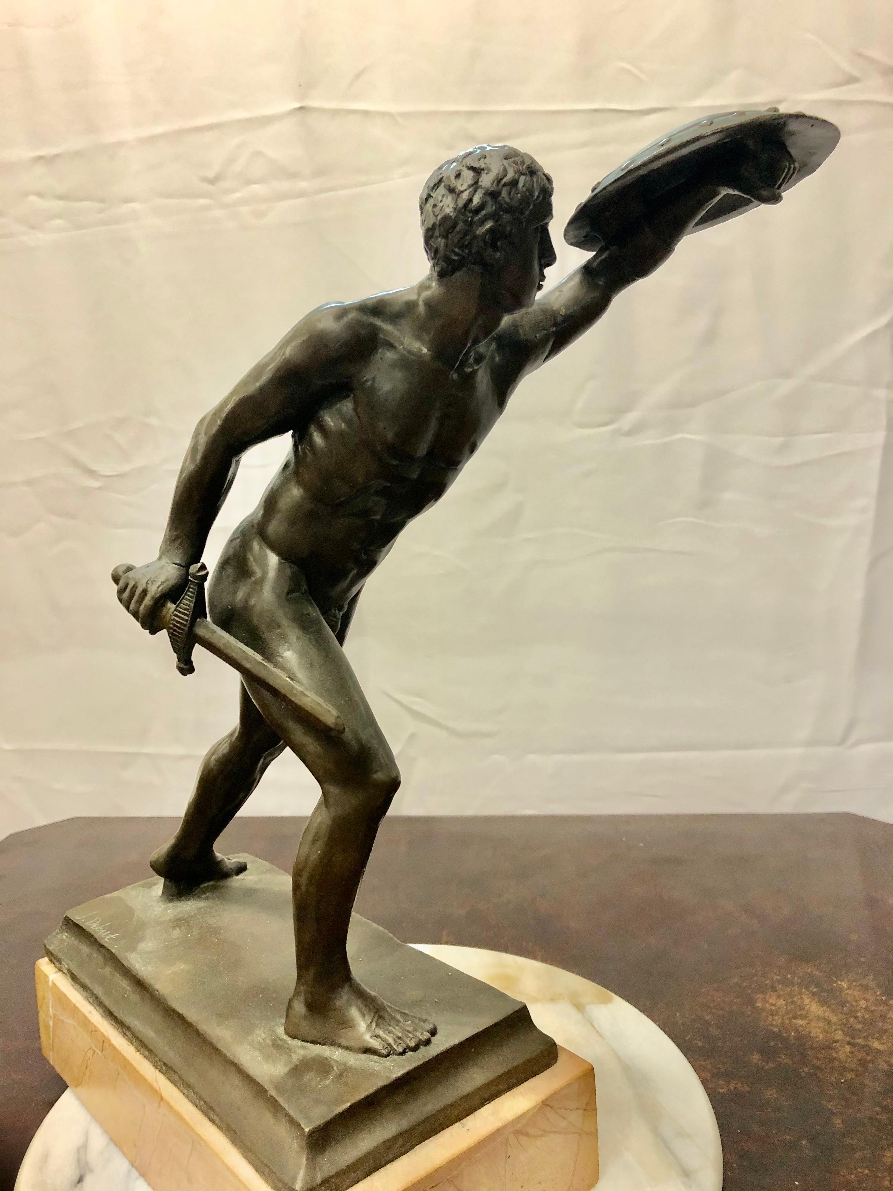 Jean Didier Debut: 1824-1893. Well listed 19th century French sculptor. He has had auction results over $17,000. We believe this fabulous bronze gladiator to be very rare as we could not find another example. The height including base is 16 inches.