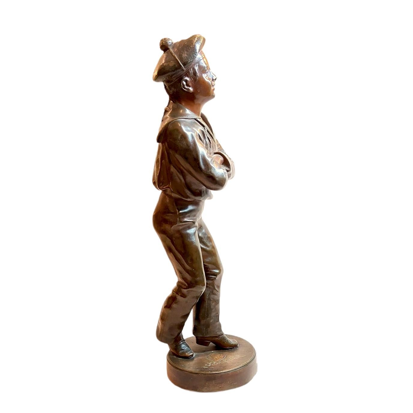 J. GARNIER: a charming BRONZE FIGURE of a young sailor-boy, dressed in 