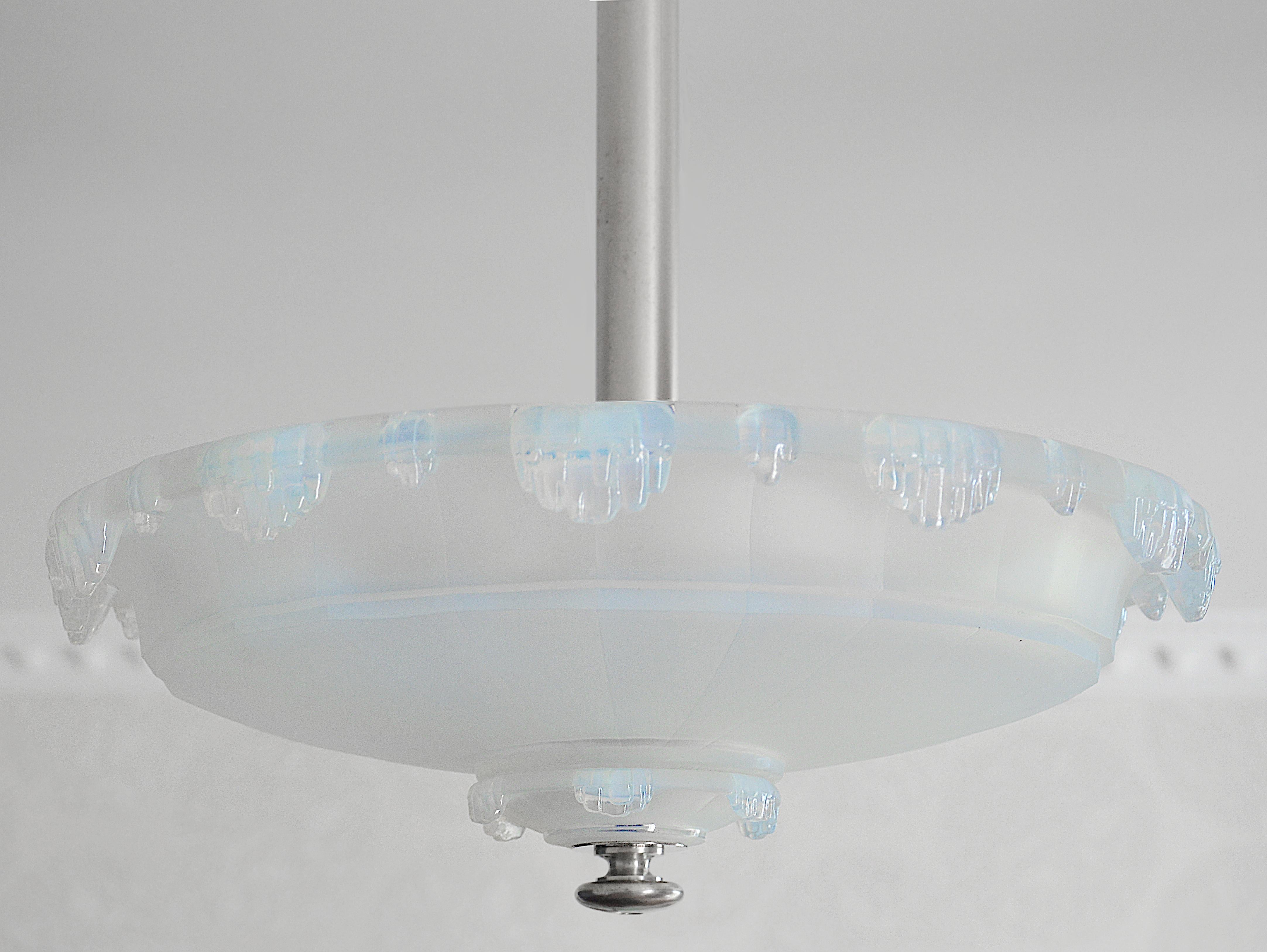 French Art Deco modernist opalescent pendant chandelier by Jean Gauthier, (Paris), France, circa 1925. Large thick opalescent glass shade hung at its silver plated brass frame. Same period as Lalique, Sabino, Etling. Measures: Height 20.5