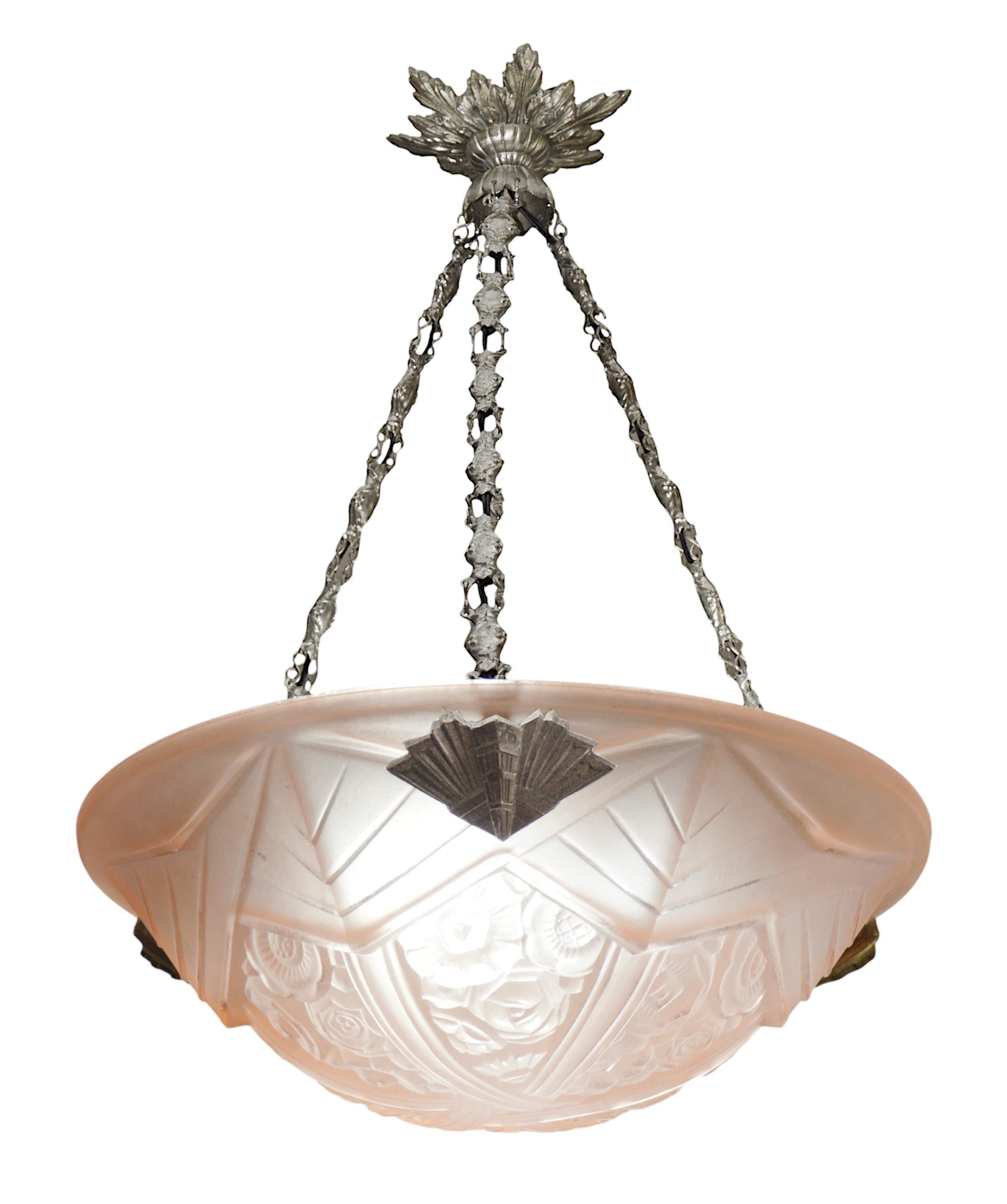 French Art Deco pendant chandelier by Jean Gauthier (Paris), France, 1920s. Pink frosted glass shade with a stylized floral pattern hung at its brass and bronze fixture. Same period as Lalique, Sabino, Etling, Measures: height: 18