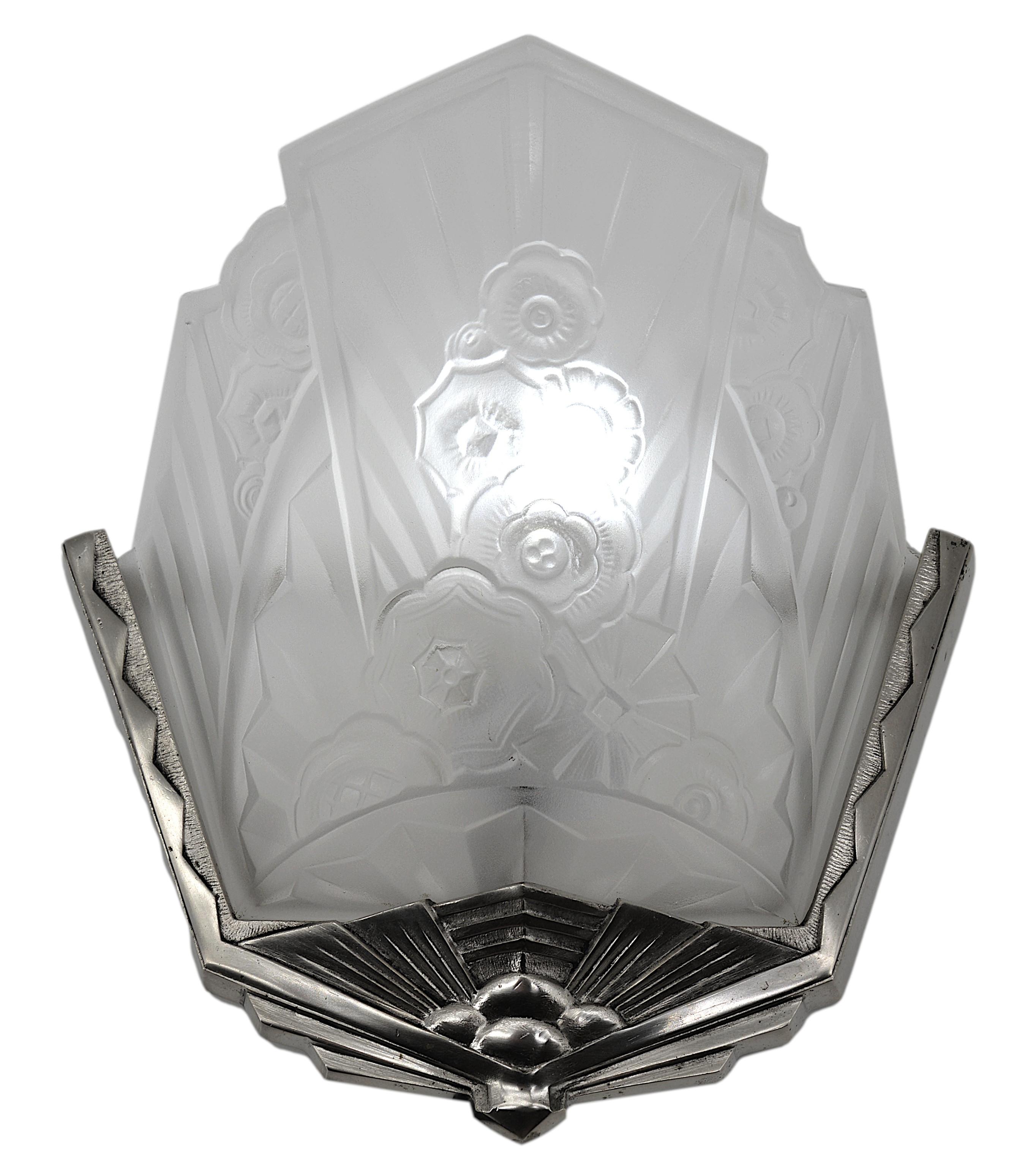Up to 3 French Art Deco wall sconces by Jean Gauthier, (Paris), 12-14 rue Jean Robert, Paris 18e, France, 1920s. Frosted molded glass shade in its silverplate bronze fixture. Measures: Each - Width : 9.25