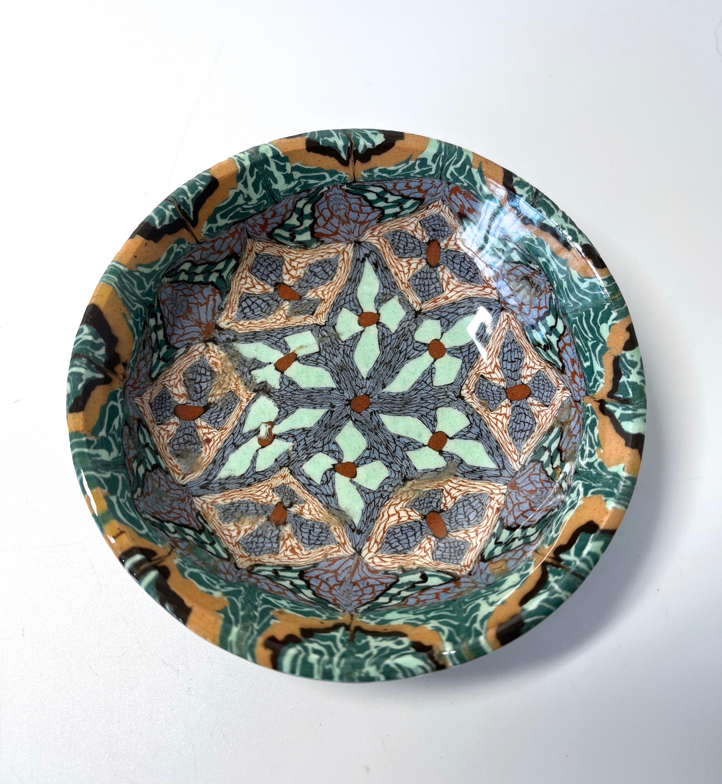 Delightful ceramic pin dish from Jean Gerbino for Vallauris, France.
A perfect introduction to the master ceramicist Jean Gerbino
Circa 1960's
Height 1 inch, Diameter 3.75 inch, 
In excellent condition. 
Wear consistent with age and use
