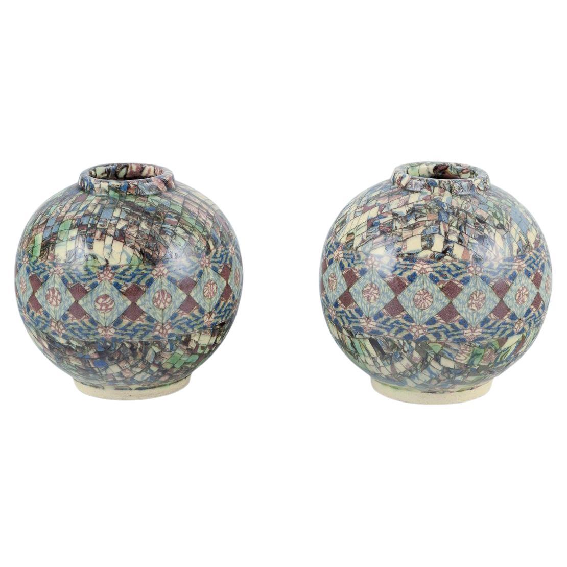 Jean Gerbino for Vallauris, France. Pair of small round stoneware vases. For Sale