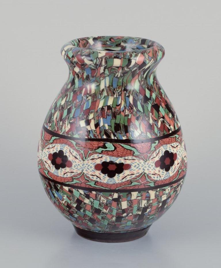 Jean Gerbino (1876-1966) for Vallauris. 
Vase in glazed ceramic with mosaic decoration.
Mid-20th century.
In excellent condition.
Stamped.
Dimensions: Diameter 14.0 cm x Height 19.5 cm.
