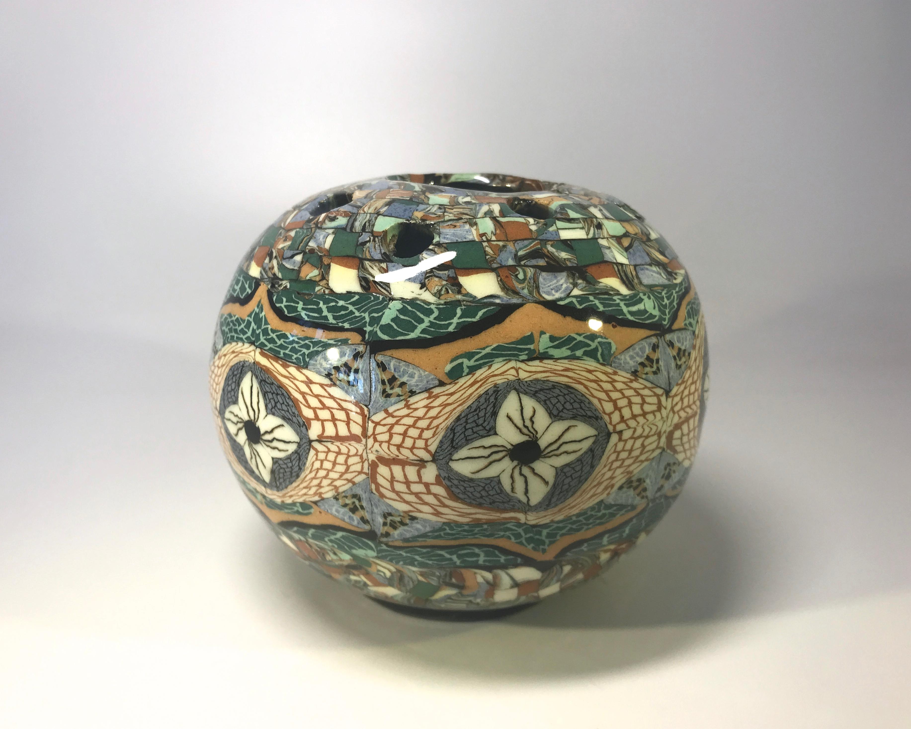 Jean Gerbino for Vallauris, France, ceramic glazed teal & blue mosaic posy potpourri vase 
An intriguing, tactile vase with superb mosaic pattern. 
Circa 1960's
Signed Gerbino to base
Measures: Height 4 inch, diameter 4.5 inch, 
In very good
