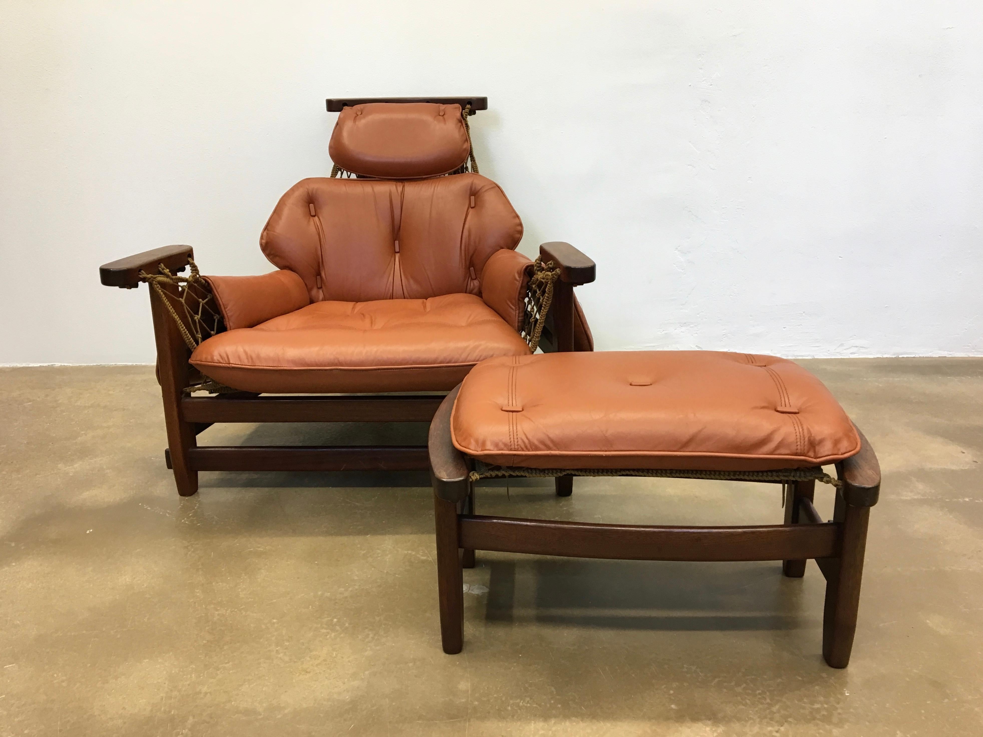 Gran Captain armchair and ottoman designed by Jean Gillon in 1960s, and produced by Wood Art. The armchair is made of mahogany wood and leather. It consists of two pieces, the armchair and the ottoman.