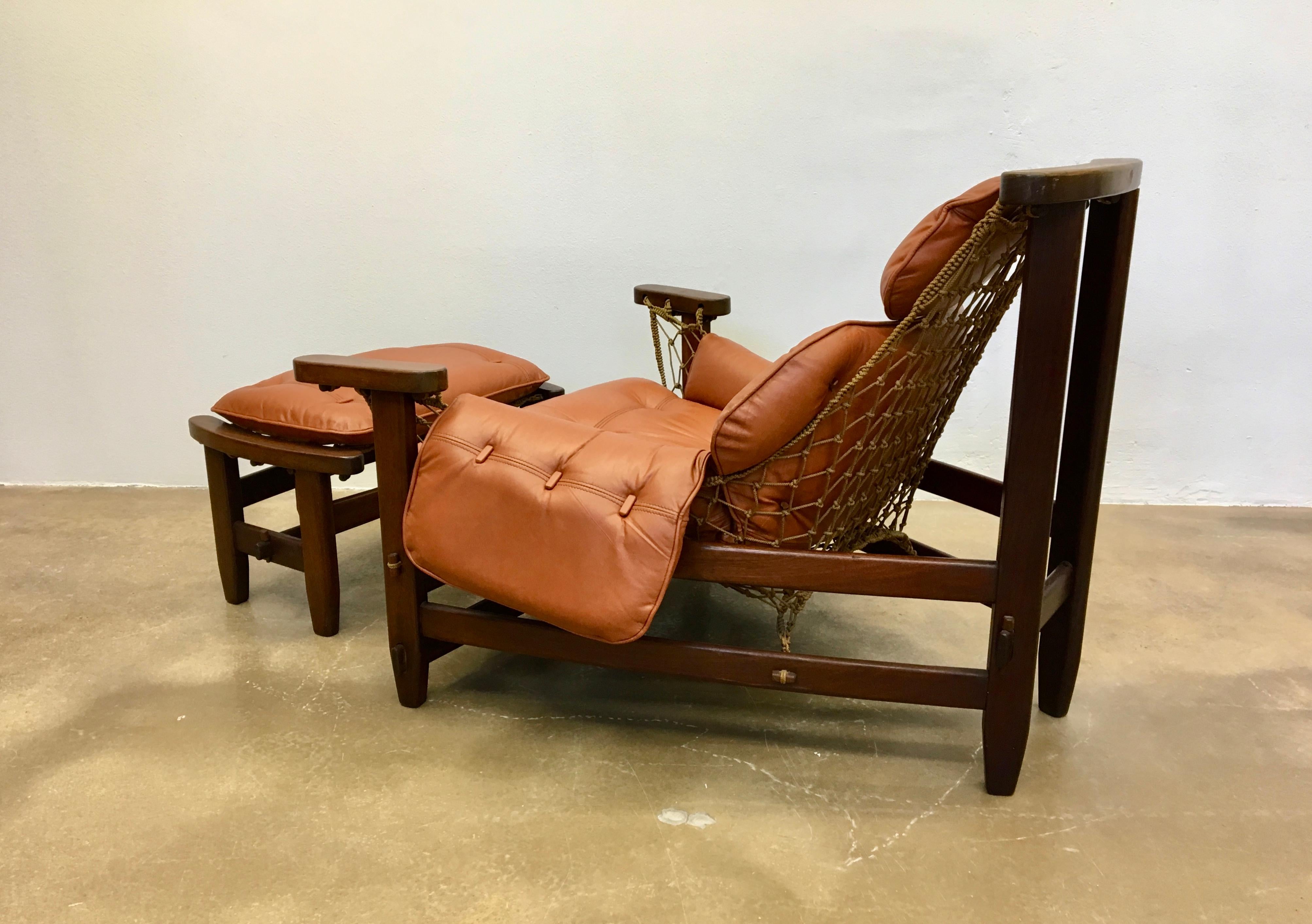 20th Century Jean Gillon 1960s Gran Captain Leather and Mahogany Armchair and Ottoman