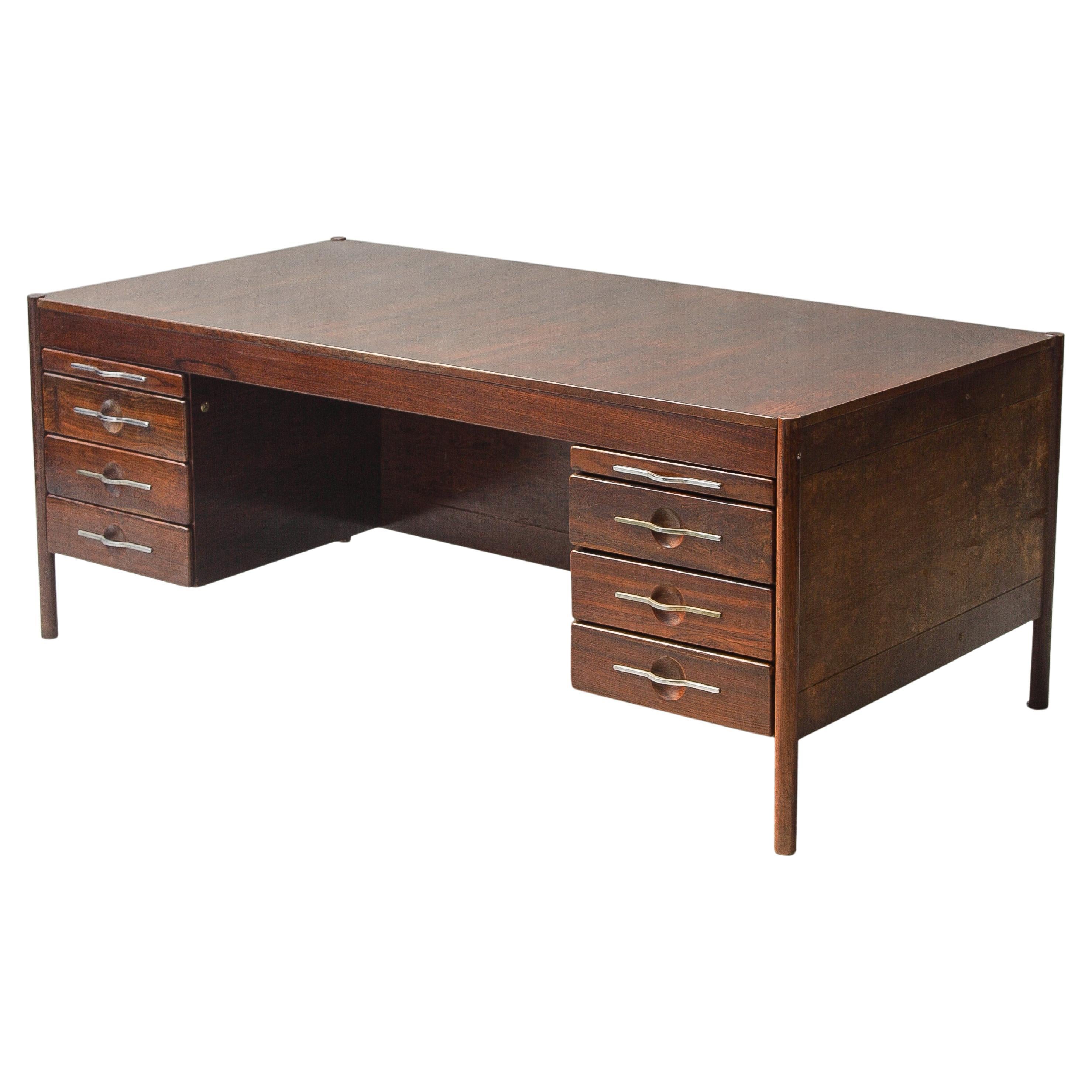 Jean Gillon - Italma - 1960s executive desk table in rosewood labeled 6 drawers