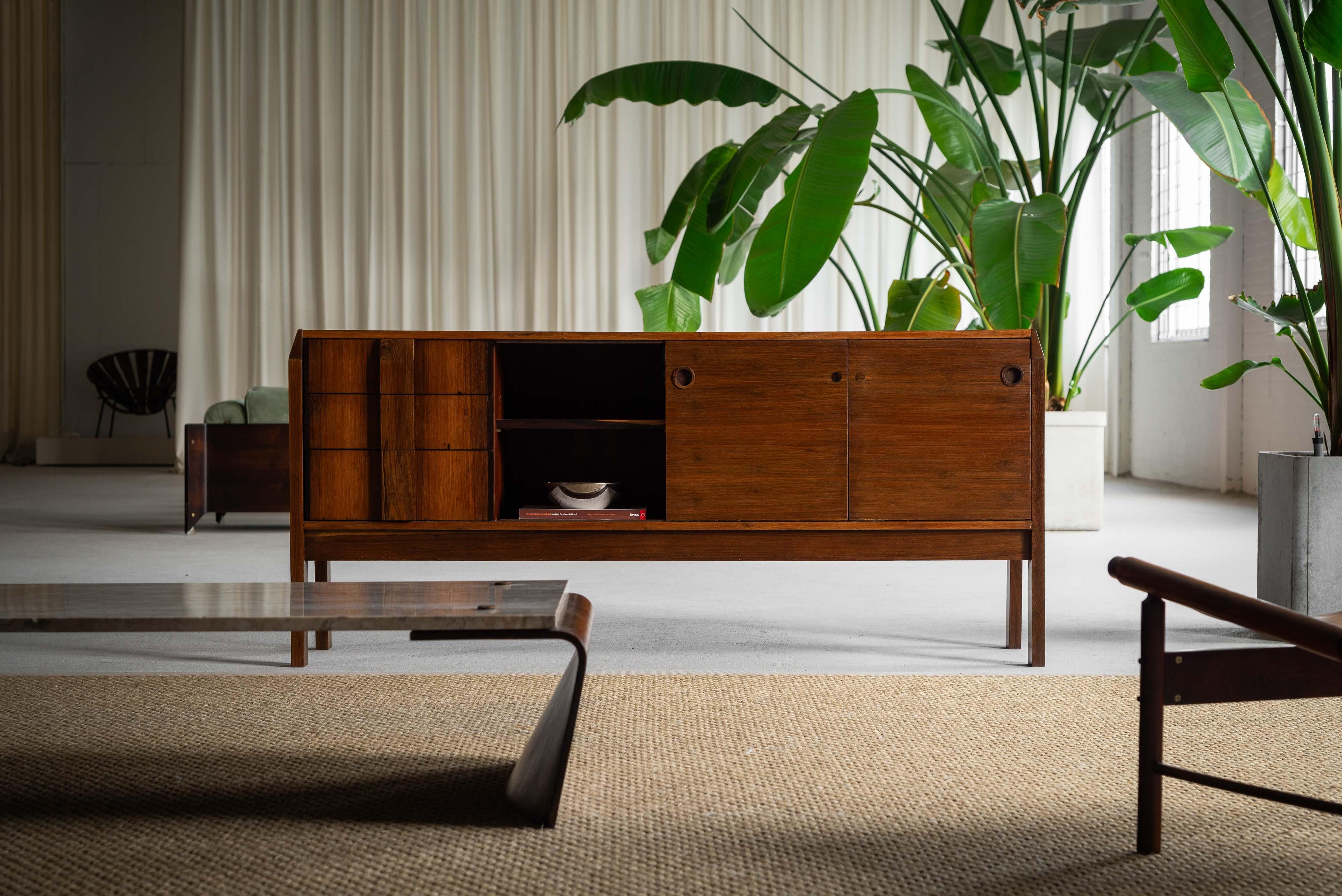 Very nice and rare sideboard designed by Jean Gillon and manufactured by Italma, Brazil 1960. Made from patchwork rosewood veneer, which draws inspiration from designs by Jorge Zalszupin for l'Atelier. The thoughtful design features slightly angled