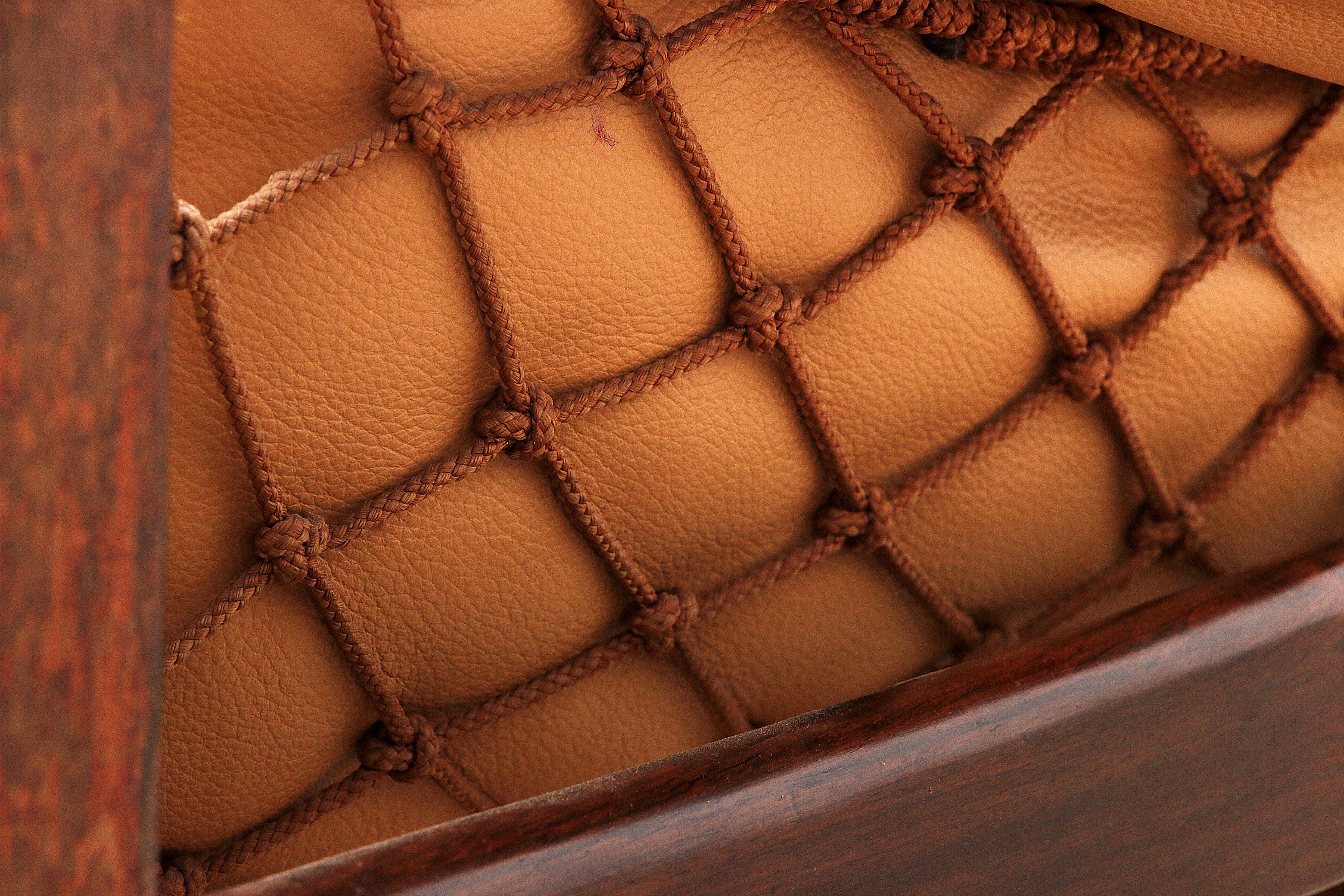 Jean Gillon 'Jangada' lounge chair and ottoman in tropical wood and leather. 5