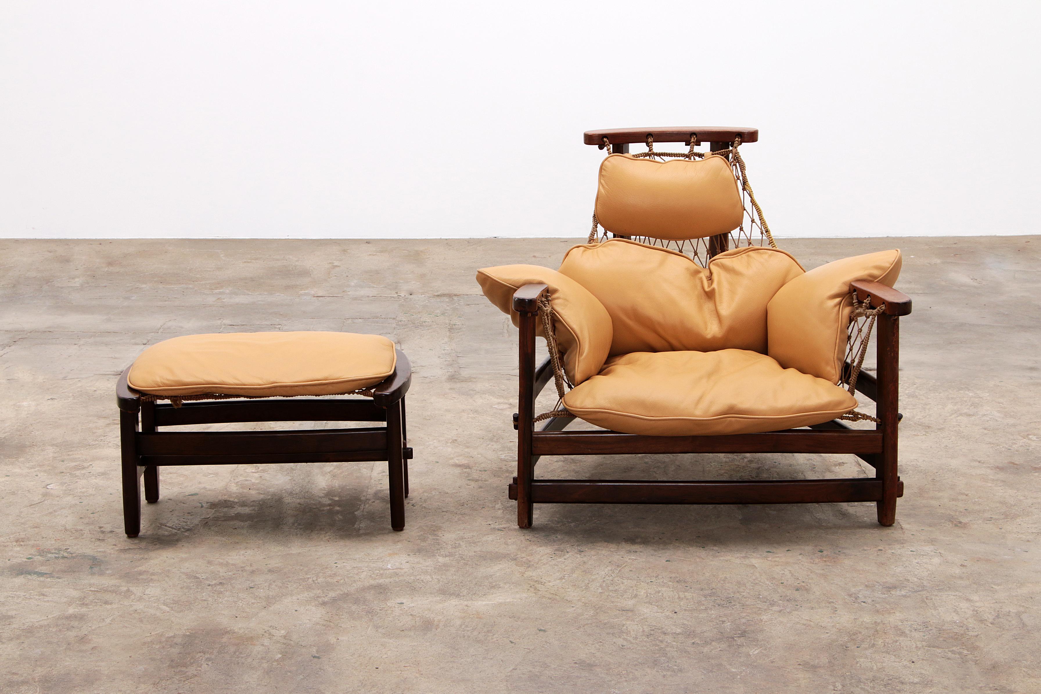 Brazilian Jean Gillon 'Jangada' lounge chair and ottoman in tropical wood and leather.