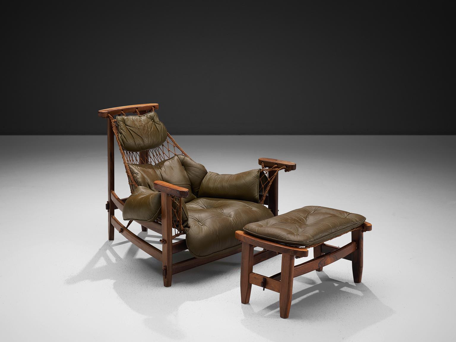 Jean Gillon, 'Jangada' armchair and ottoman, rosewood, nylon rope, leather, Brazil, 1968.

This robust and hefty armchair is designed by Jean Gillon. The originality of this Janganda comes from the concept of the body being captured by the piece
