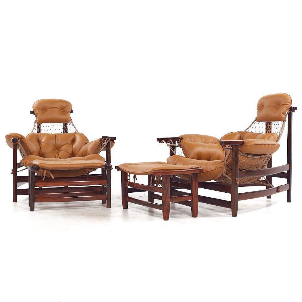 Mid-Century Modern Jean Gillon Jangada MCM Brazilian Rosewood Leather Lounge Chairs Ottomans - Pair For Sale