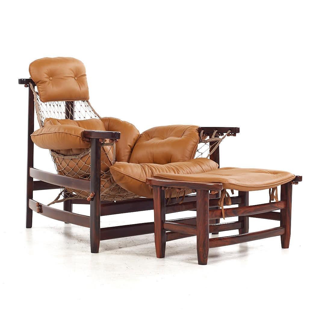 Jean Gillon Jangada MCM Brazilian Rosewood Leather Lounge Chairs Ottomans - Pair In Good Condition For Sale In Countryside, IL
