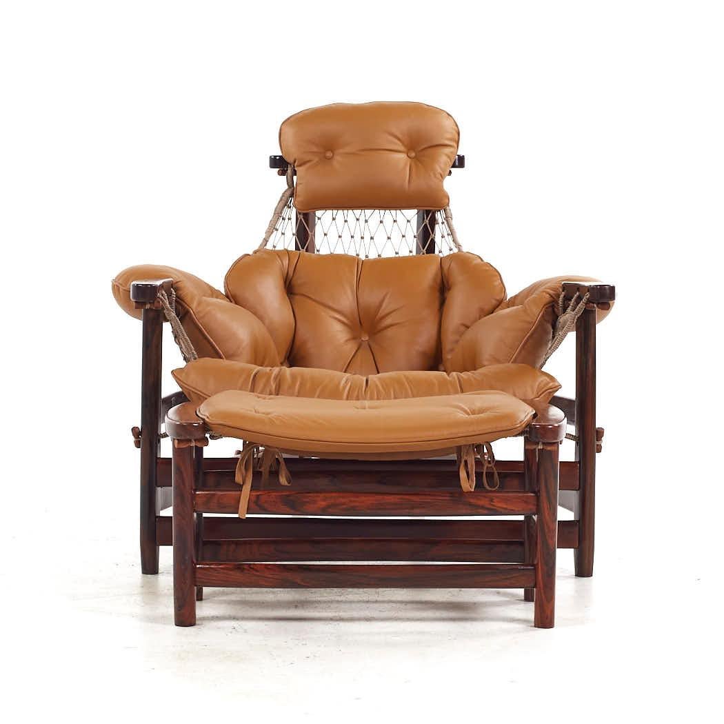 Late 20th Century Jean Gillon Jangada MCM Brazilian Rosewood Leather Lounge Chairs Ottomans - Pair For Sale