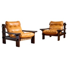 Jean Gillon Leather Paddle Arm Chairs