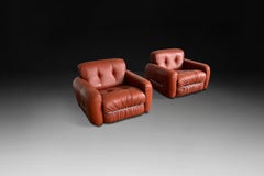 Jean Gilion Sillas de salón en cuero color terracota para Probel, Brasil Años 70