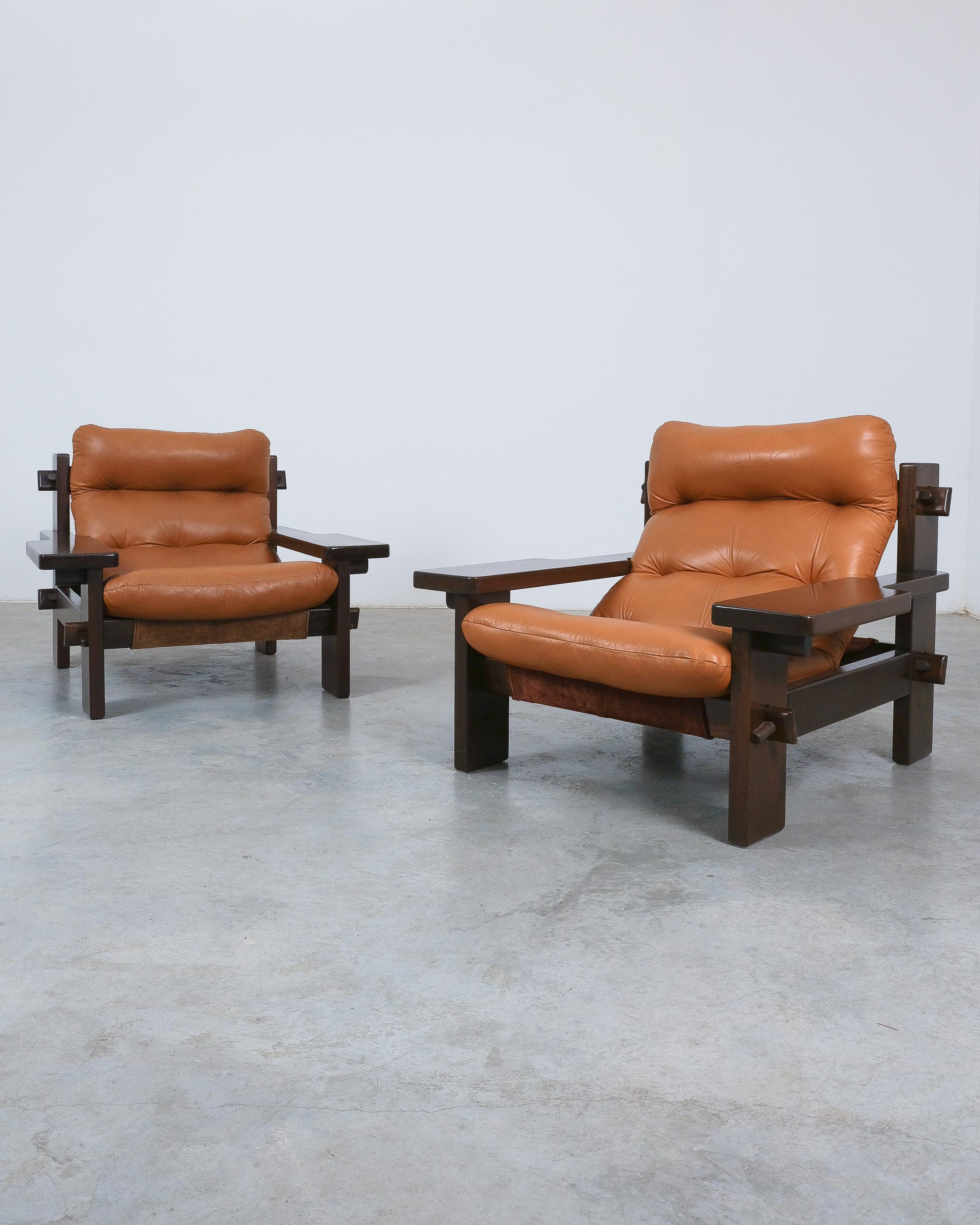 Paddel Sesselpaar von Jean Gillon für Probel, aus cognacfarbenem Leder und Holz

Schöne und bequeme Stühle in gutem Zustand mit kaum Verschleiß. Wir haben auch ein passendes Sofa (3-Sitzer) verfügbar. Gillons Arbeiten zeichnen sich durch einen