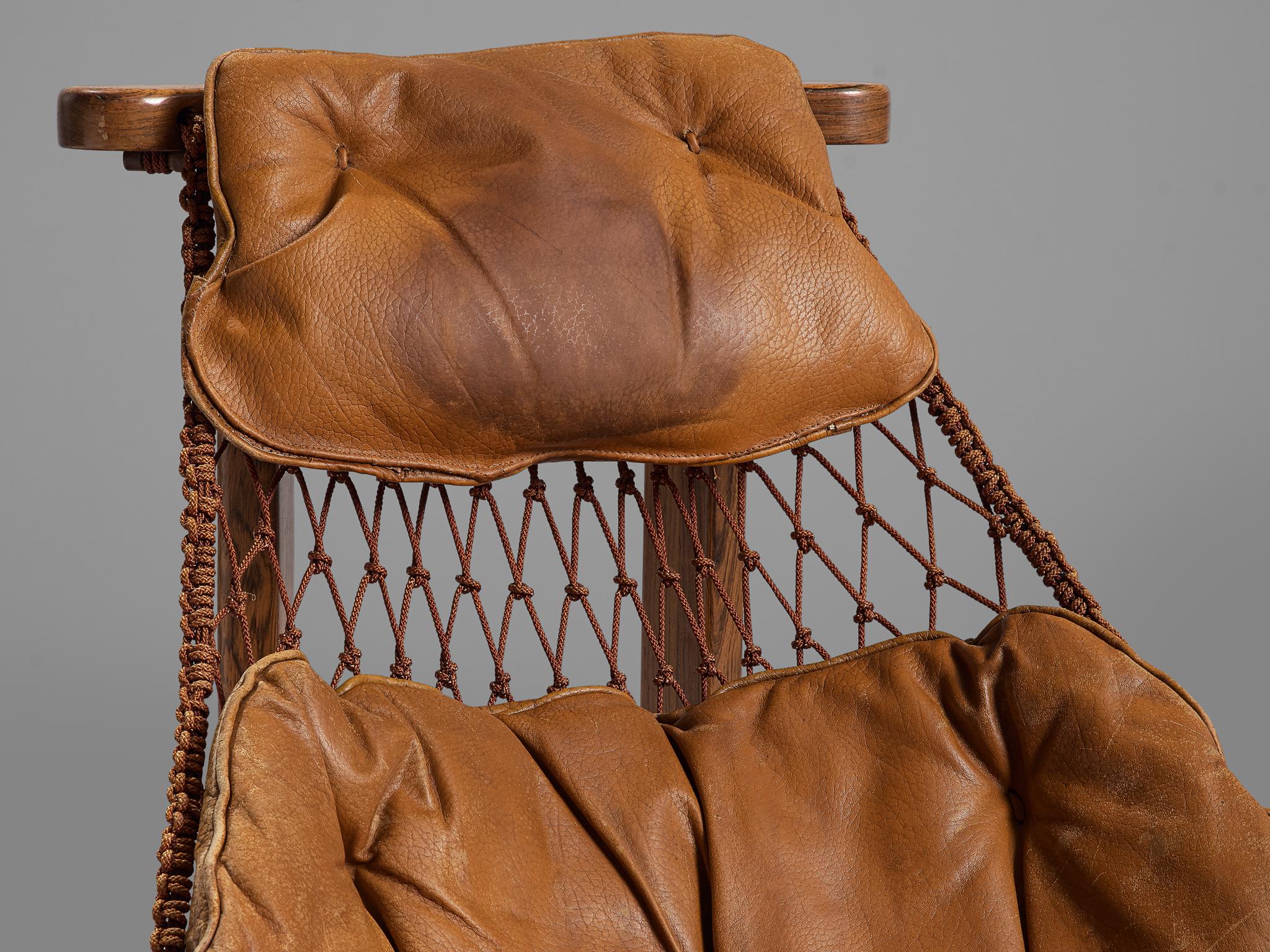Mid-20th Century Jean Gillon Patinated 'Jangada' Lounge Chair in Cognac Leather