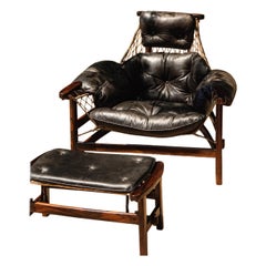 JEAN GILLON Rare armchair and ottoman model Jangada