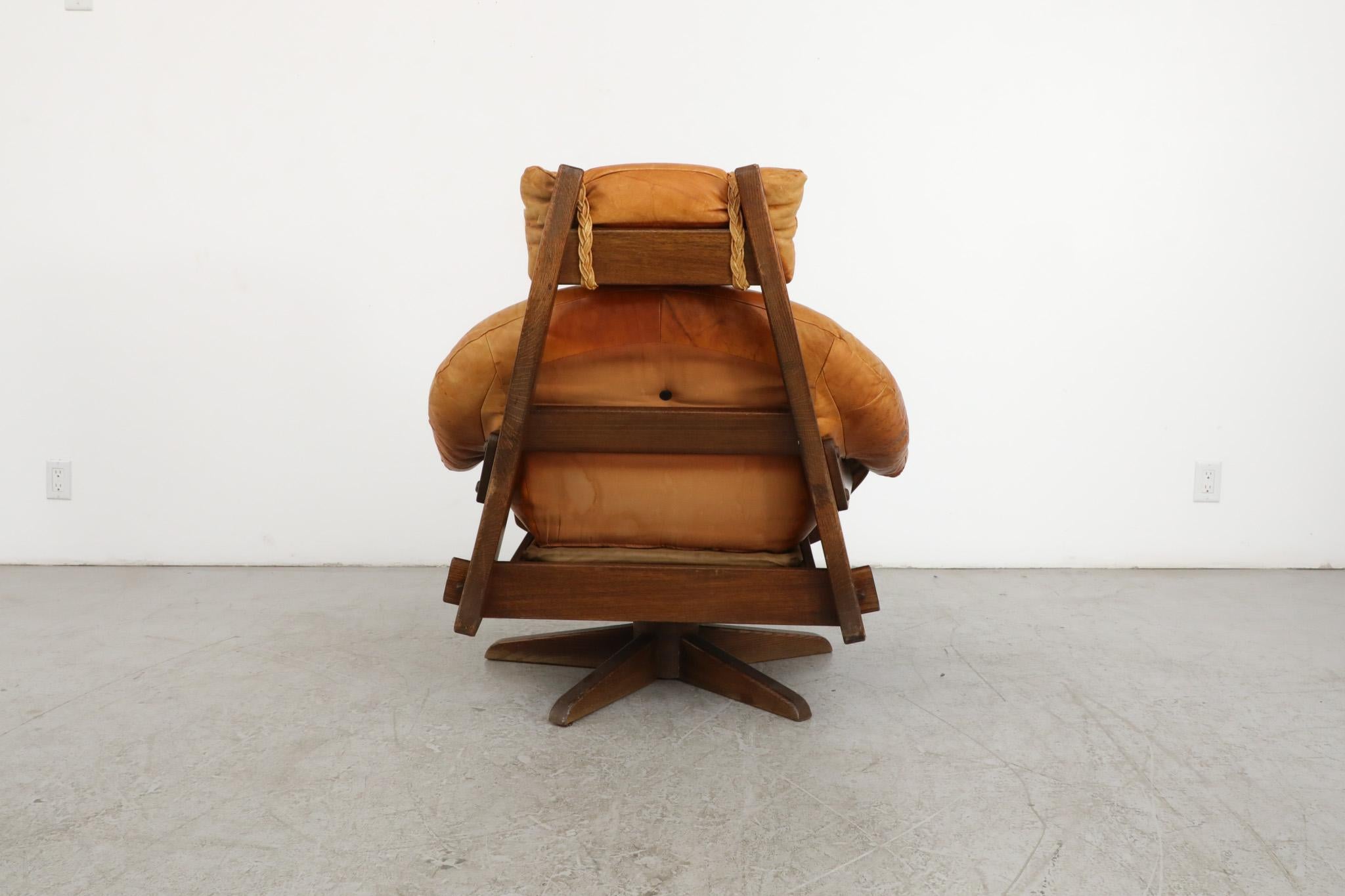 Mid-20th Century Jean Gillon Style Brutalist Cognac Leather and Oak Swivel Lounge Chair For Sale
