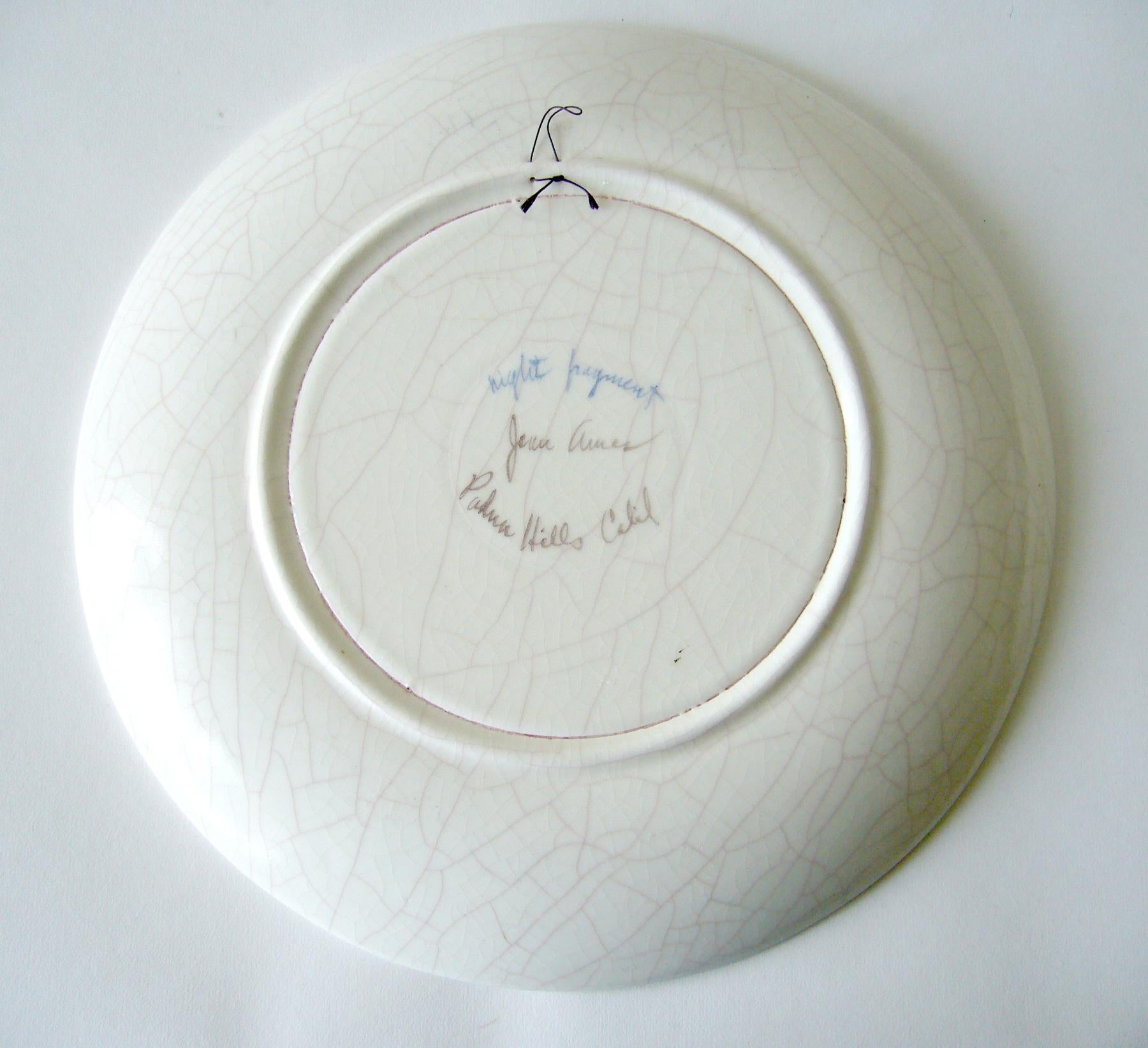 Hand painted decorative crackle glaze charger plate entitled Night Fragment, created by Jean Goodwin Ames of California. Plate measures 12