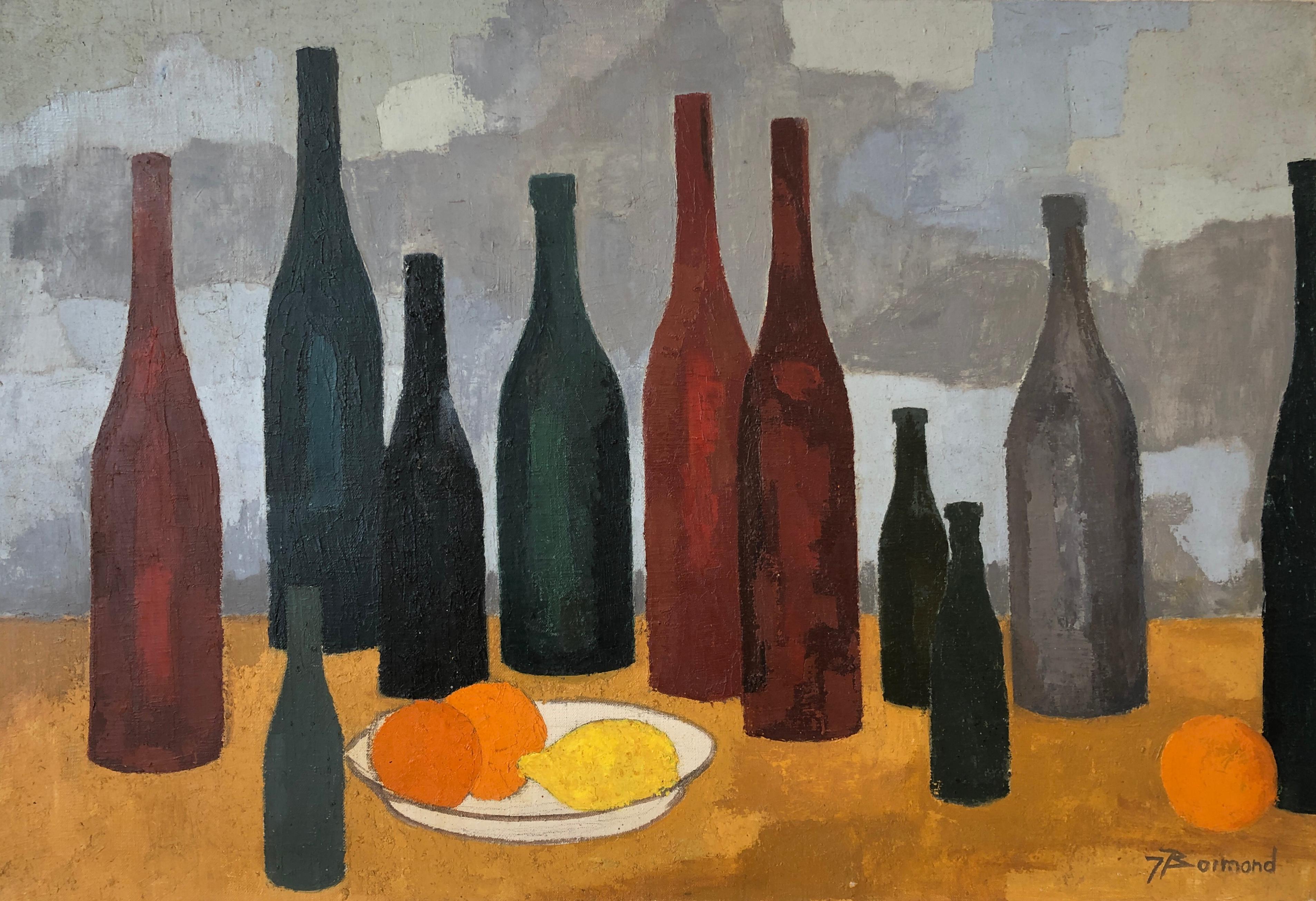 Bottles and cut of oranges and lemon