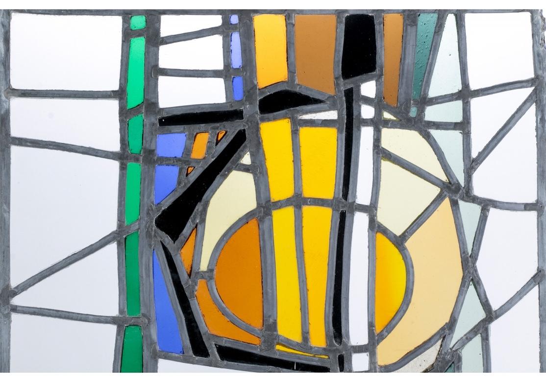 A rare and outstanding piece of stained glass by the French/American (1930-2017) artist Jean-Jacques Duval. Etched signature and N.Y. N.Y. on the clear glass lower right corner. The leaded polychrome abstract glass panel, possibly for a window, is