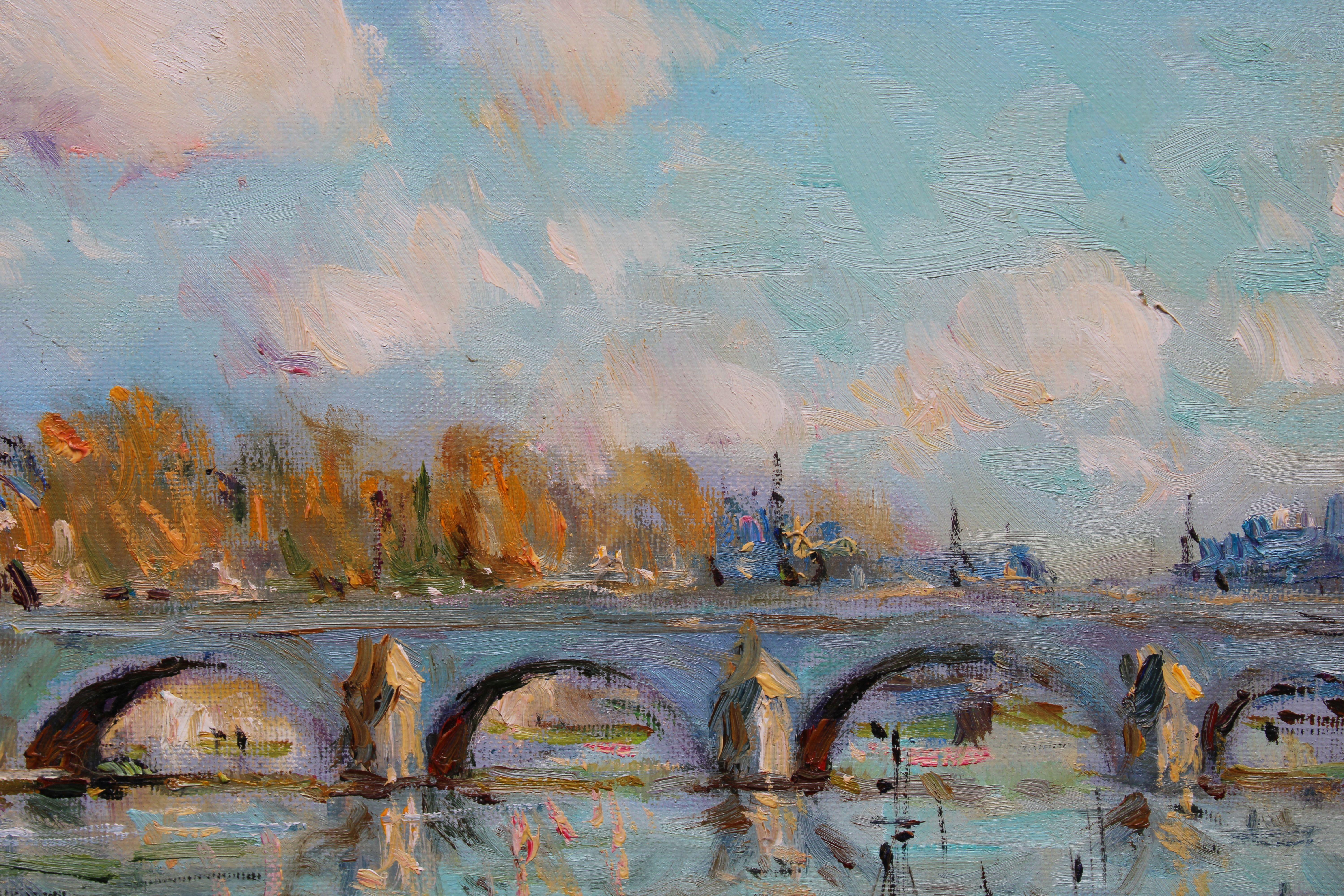 La seine à Paris. Oil on canvas, 38x46.5 cm

The artwork depicts a landscape scene of the Seine River in Paris.

The dominant color palette of the painting consists of bright tones, with a particular emphasis on light blue hues. This choice of color