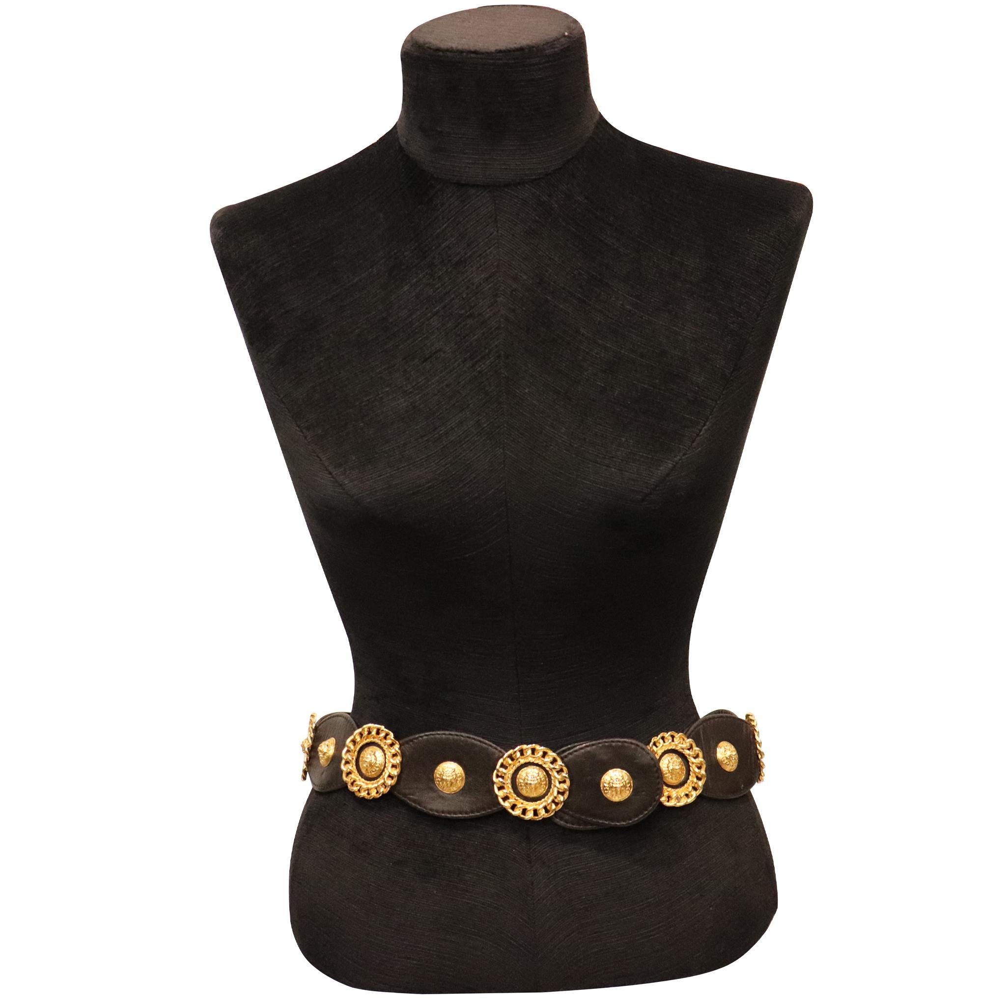 Jean L'Insolite Black Leather W/ Gold Accents Belt. From 1980s is in excellent condition 

Measurements: 

Longest Length - 31.6 inches
Shortest length - 30.4 inches 
Height - 2 inches 