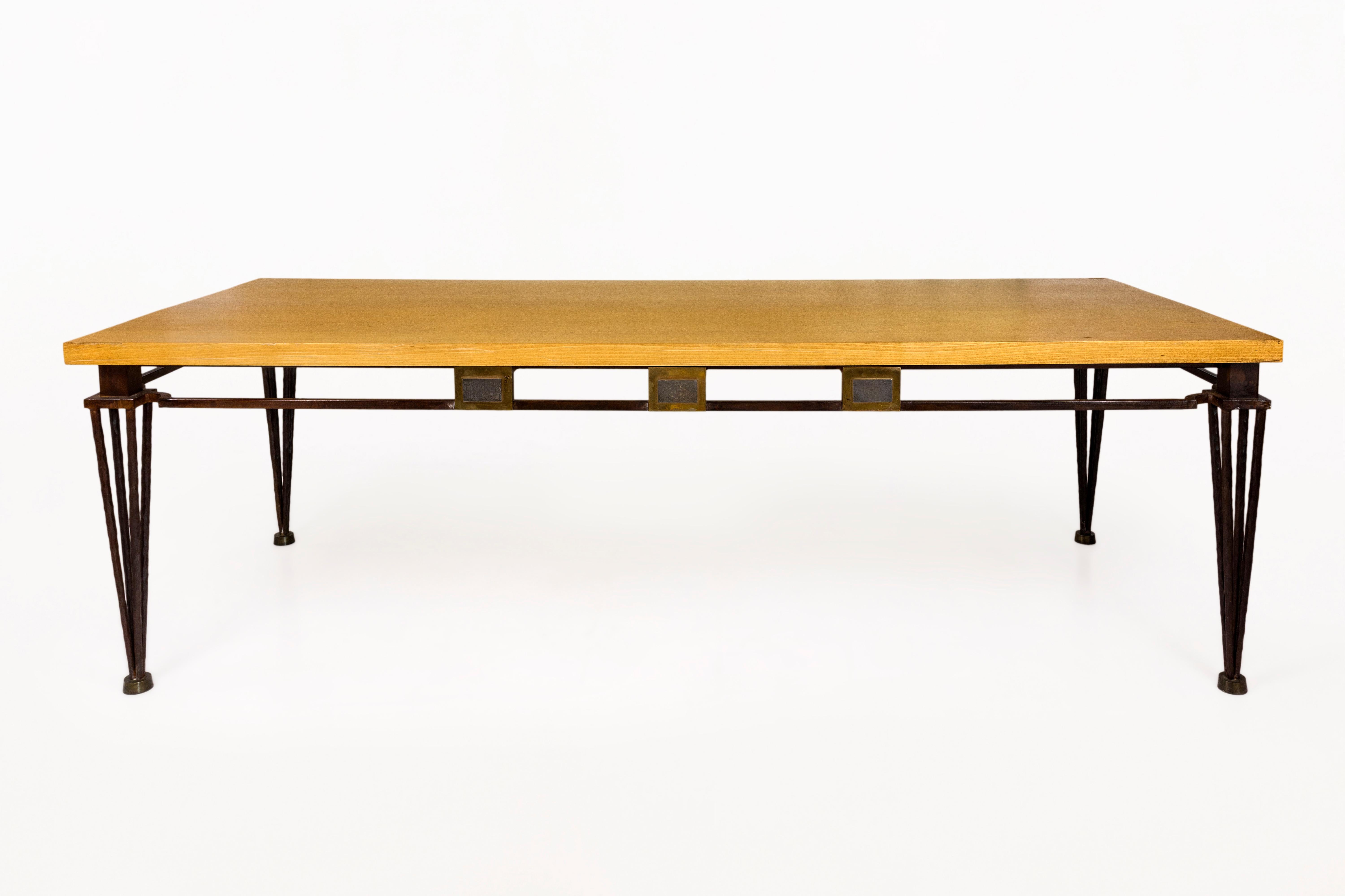 Jean Louis Hurlin dining table.
Hammered iron base and oak top
Decorative metal side panels
Important table: Size, design, style,
circa 1980, France.
Good vintage condition.
Provenance: Acquired from the collector for whom the artist made the table.