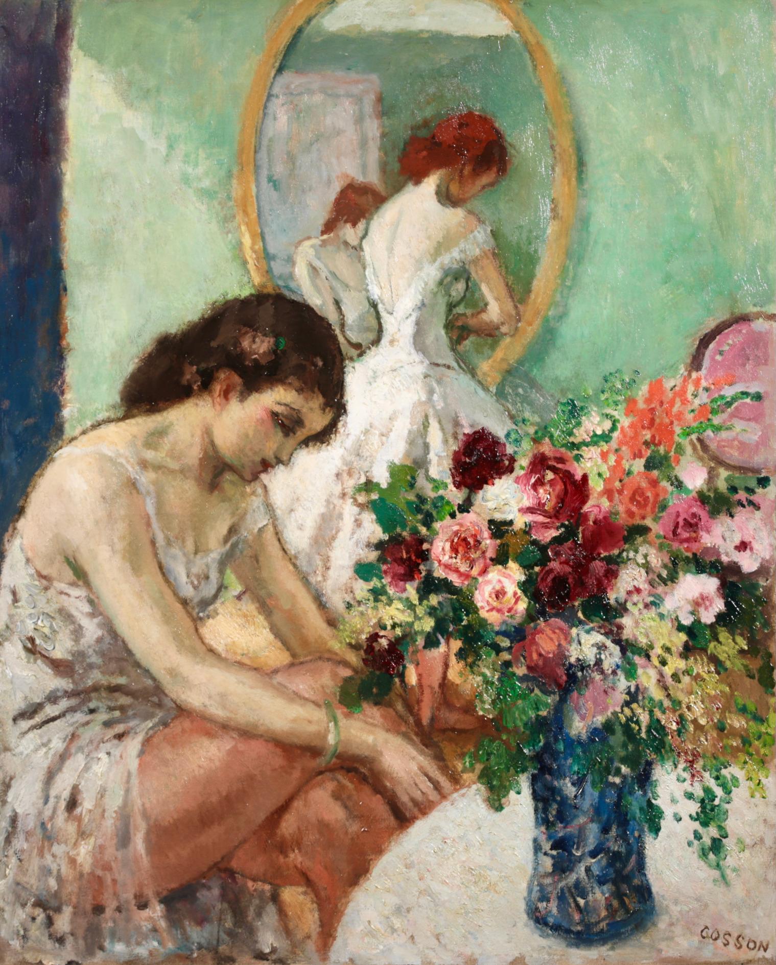 Post impressionist figurative oil on original canvas circa 1930 by French painter Jean-Louis-Marcel Cosson. The work depicts ballerinas getting dressed in white tutus preparing for a performance. A vase of beautiful flowers is placed on a dressing