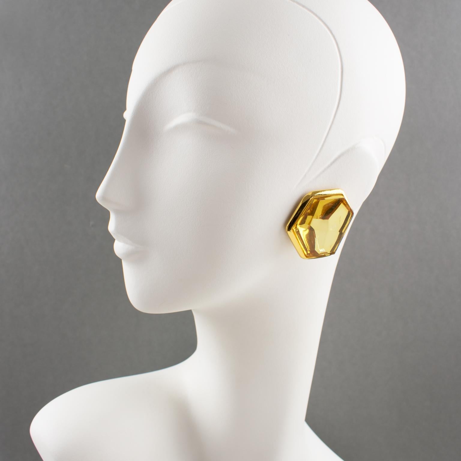 Exquisite French designer Jean Louis Scherrer Paris signed clip-on earrings. Featuring large dimensional rock shape, with a gilt metal frame and yellow champagne faceted resin cabochon. Signed underside with gilded tag: 