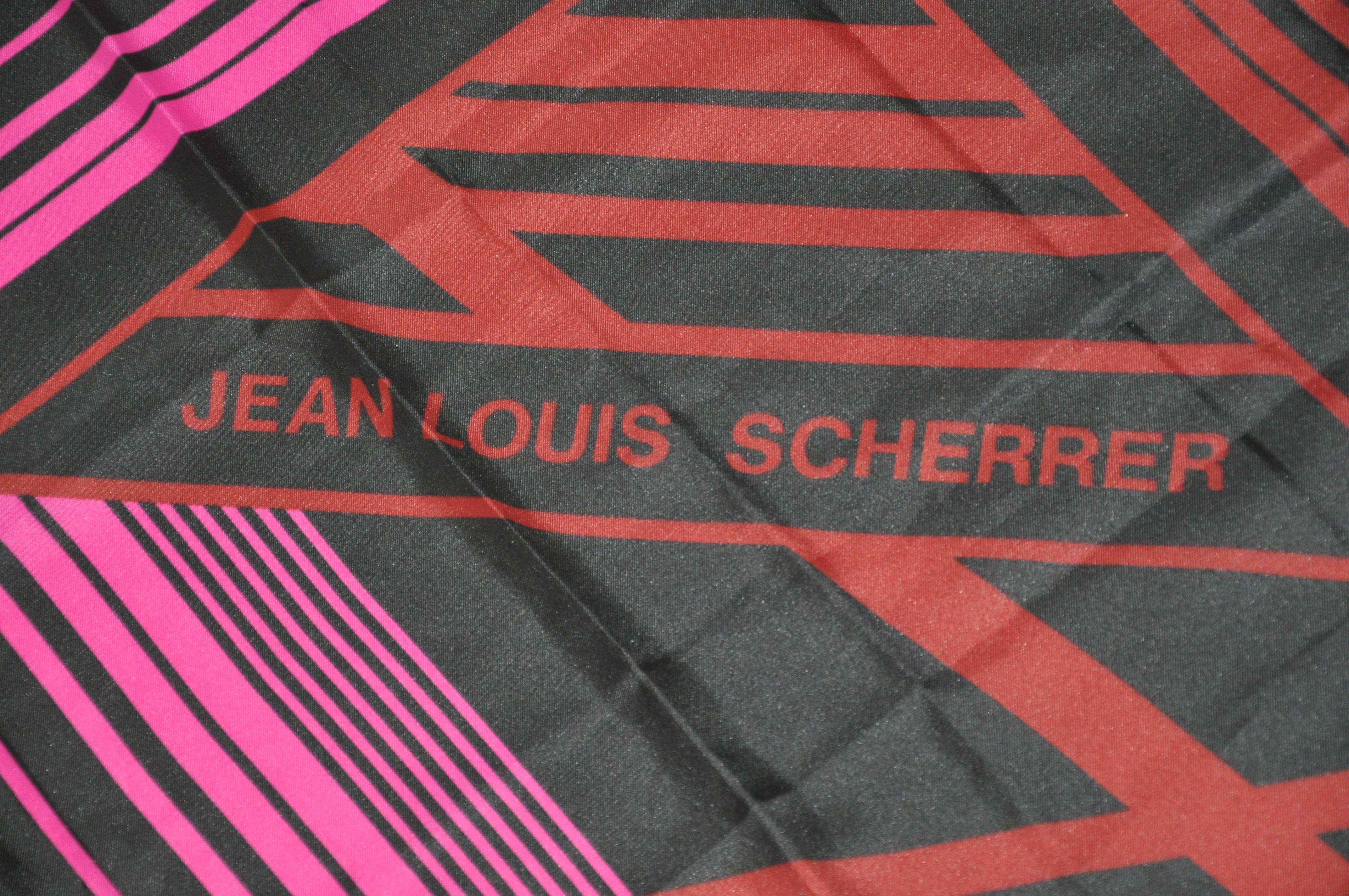      Jean Louis Scherrer signature navy & fuchsia scarf measures 26 inches by 27 inches. Made in Italy of Polyester. 