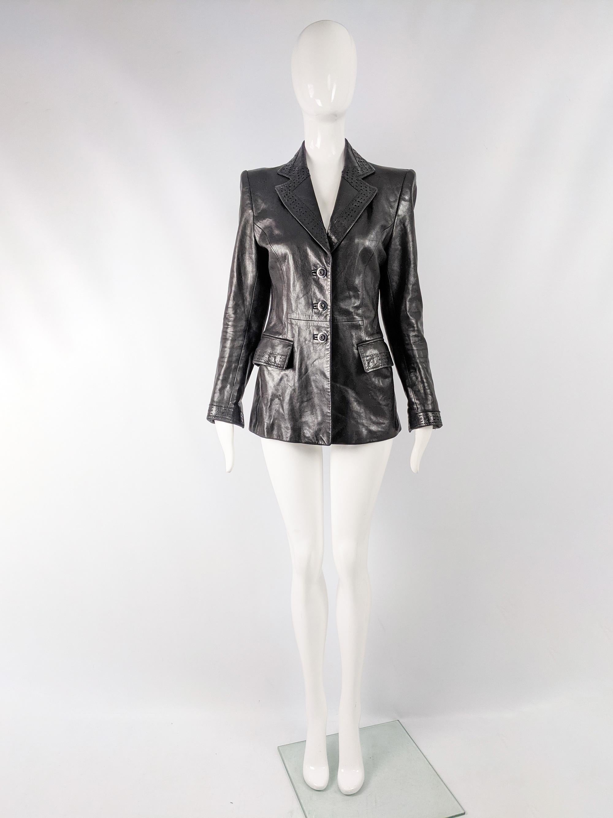 A fabulous womens leather jacket from the 80s by luxury french fashion designer, Jean Louis Scherrer with pointed shoulders that give an edgy, runway look and contrast with the nipped waist. The pockets and lapels have elegant cut out