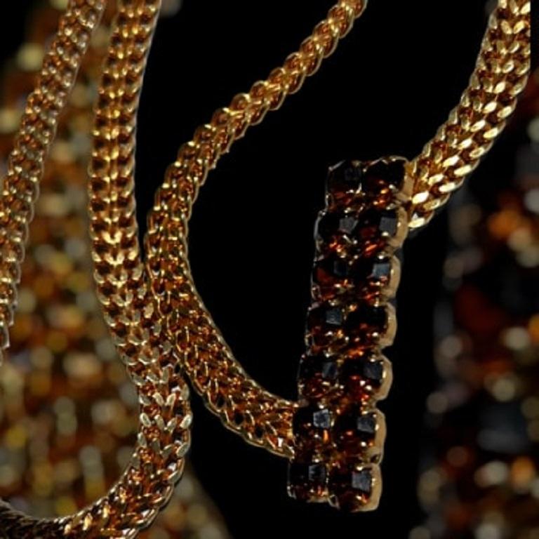 Jean-Louis Scherrer vintage necklace 70 cms In gilded metal of equivalent quality to gold plates, American flat mesh Amber Swarovski crystal.

I am a partner with French experts group , recognized by the PayPal buyer’s protection and by the Ministry