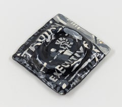 Executive (Briefbeschwerer), kleine Keramik-Skulptur