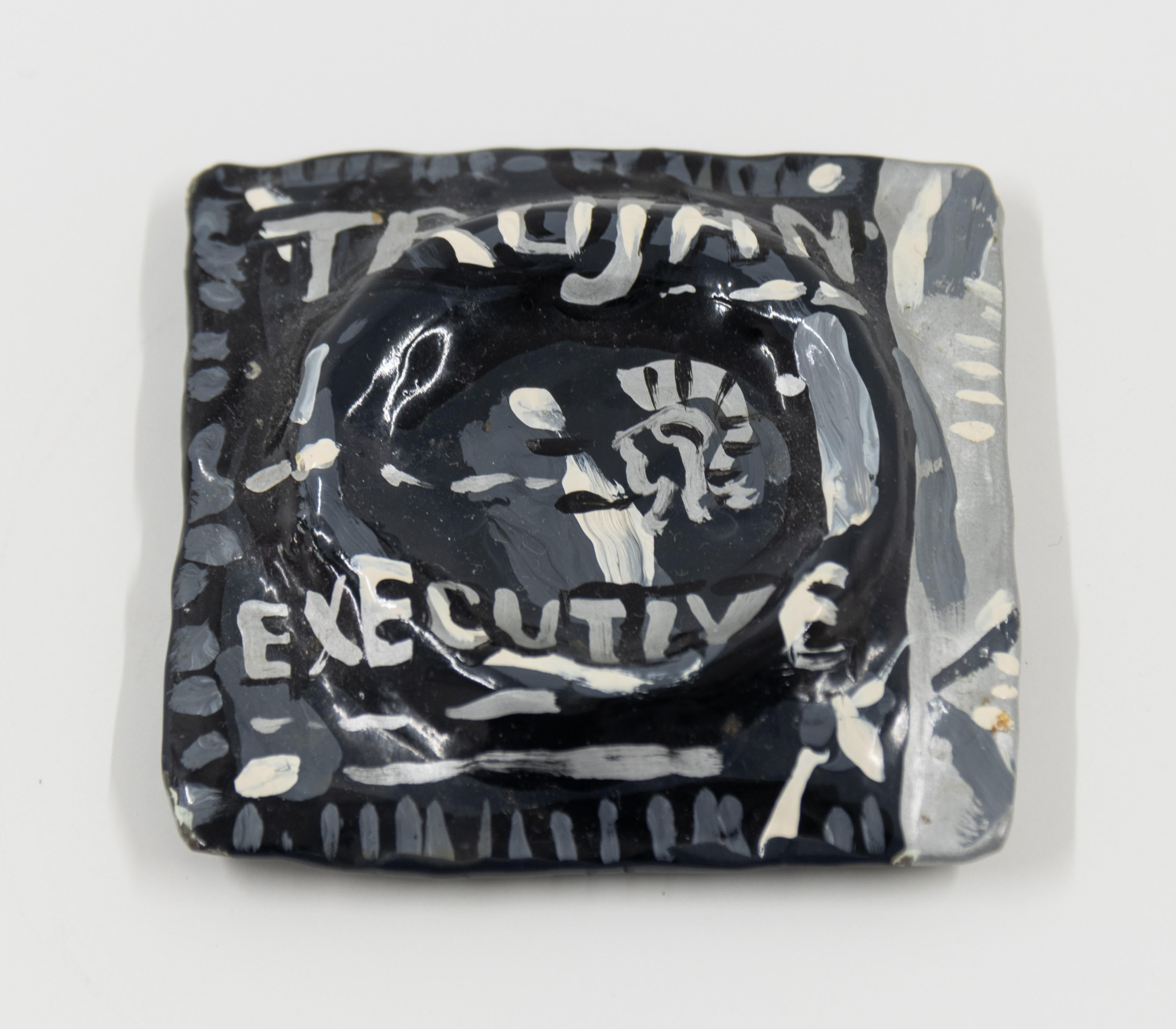 A contemporary ceramic paperweight with black, grey, and white glaze by Jean Lowe on a white background.

Executive (Paperweight)
Signed and inscribed “AP,” verso

Enamel on ceramic

2.5 x 2.75 x .5 inches

