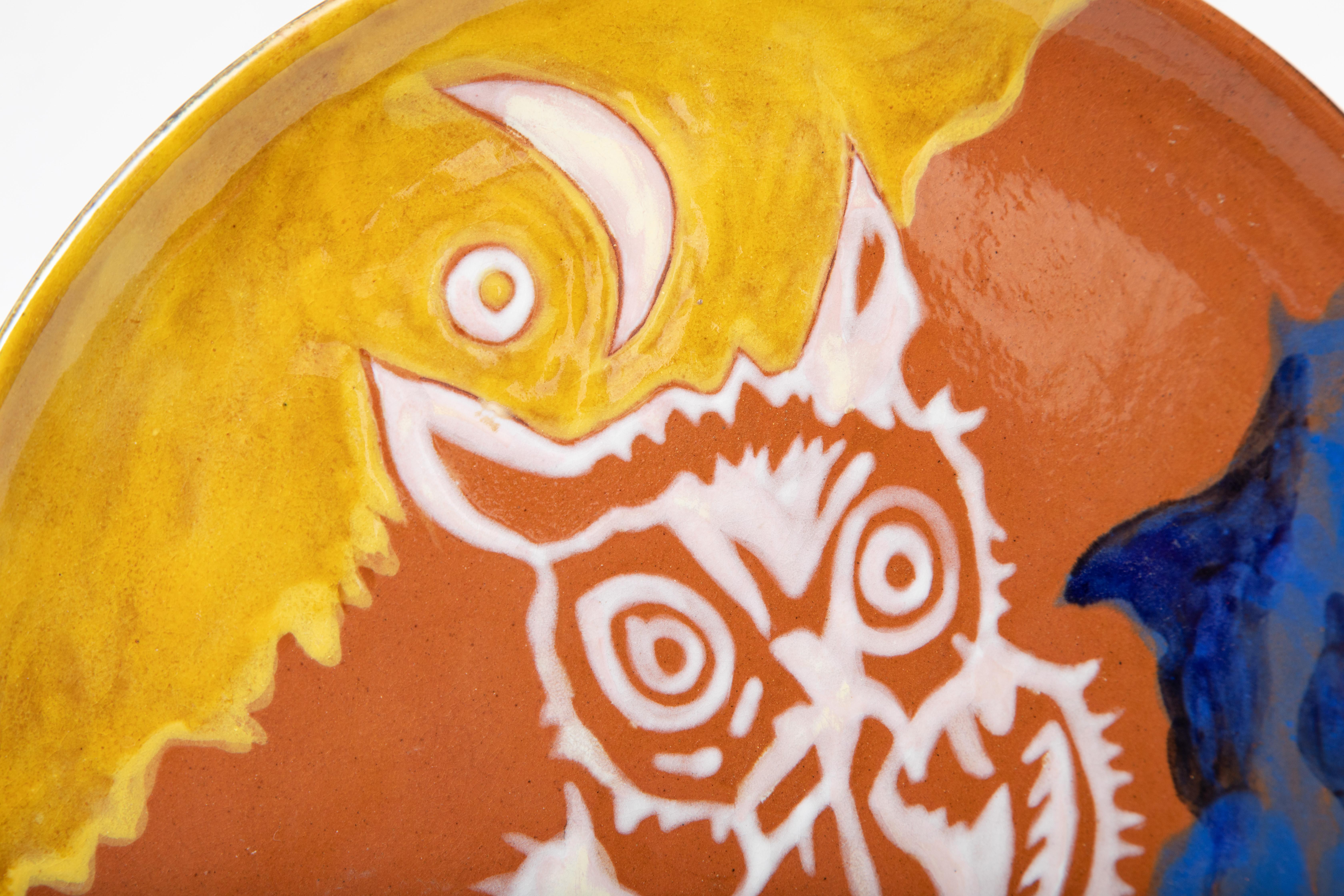 A wonderful owl or chouette Vintage Jean Lurcat hand painted enamel glazed fired ceramic wall plaque or  plate. A limited edition, 4/100 hand inscribed Saint Vicens