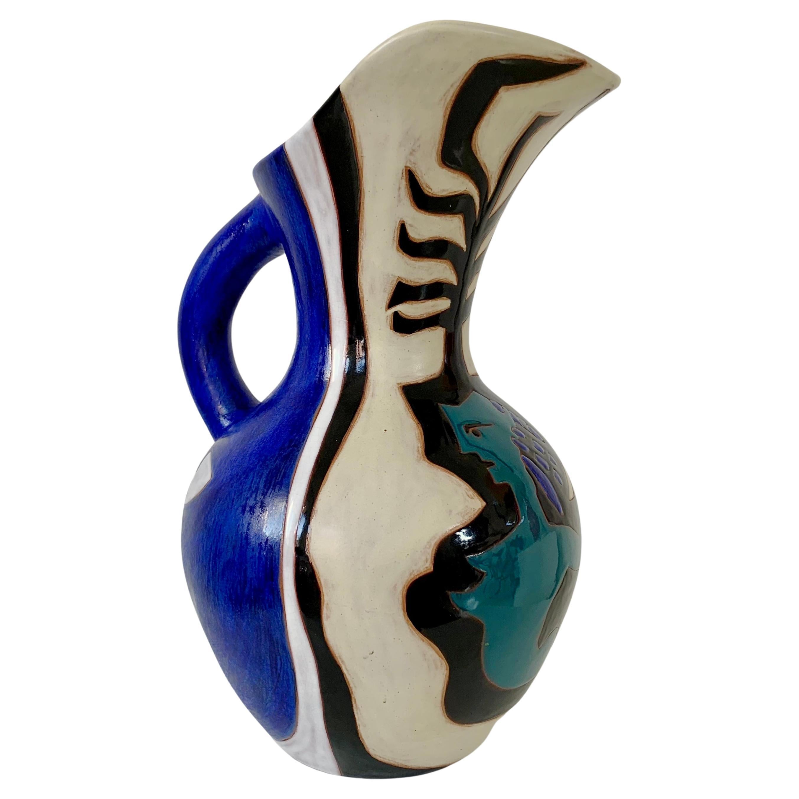 Beautiful Jean Lurçat large balustre vase or jar, circa 1950, France.
Enameled ivory/blue ceramic with black, white and turquoise stylized decor with siren and leaves .
Limited edition of 50.
Signed and numeroted: Dessin J.Lurçat Sant-Vicent B.C n°