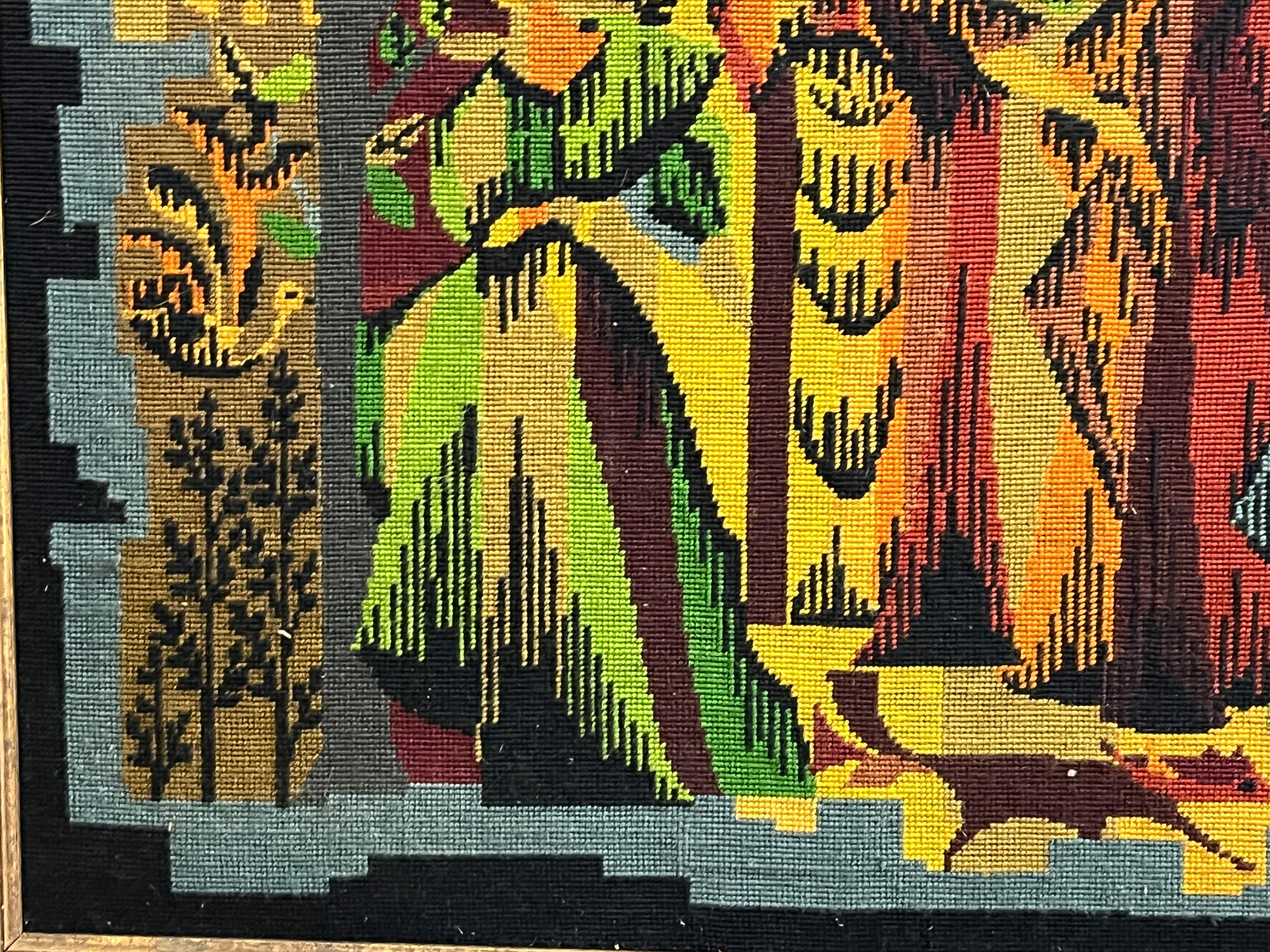 A modernist tapestry by artist Jean Lurcat, French, circa 1950, titled Les Quatre Saisons (The Four seasons) in wool now mounted in a period  giltwood frame. 