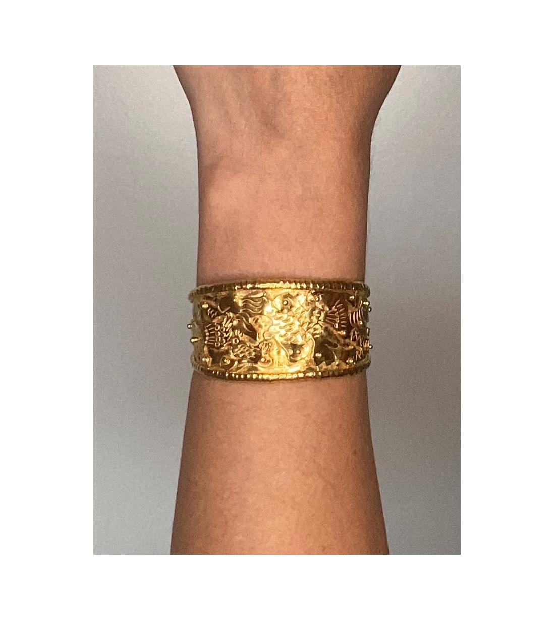 Figurative cuff bracelet designed by Jean Mahie.

A beautiful wearable art piece, created in Paris France by the artist and goldsmith Jean Mahie, back in the 1980. This rare vintage sculptural cuff bracelet is part of the Charmings Monster