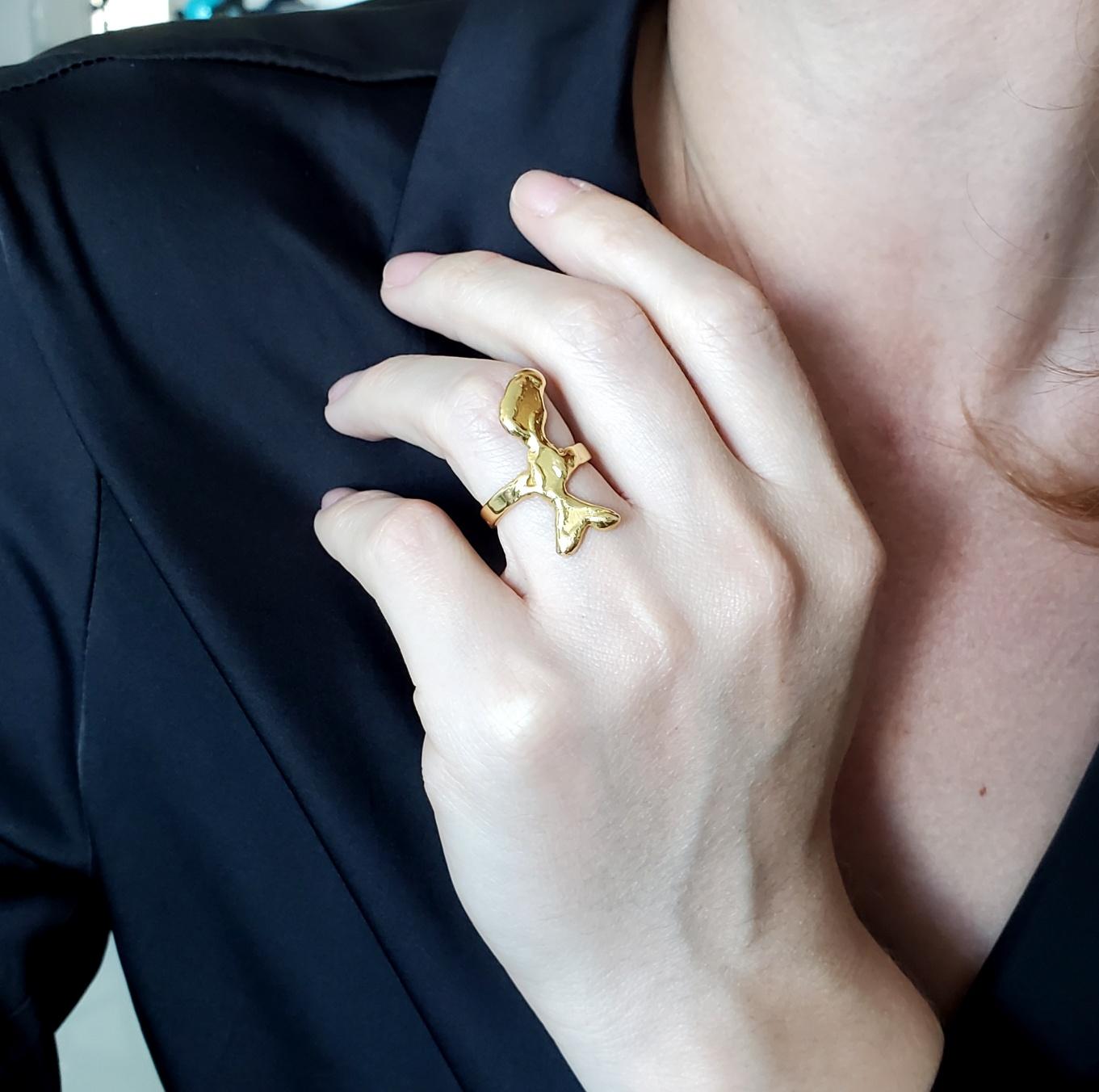 Abstract cocktail ring designed by Jean Mahie.

A beautiful piece of wearable art, created in Paris France by the artist and goldsmith Jean Mahie. This vintage sculptural ring has been crafted with abstract shape in solid rich yellow gold of 22