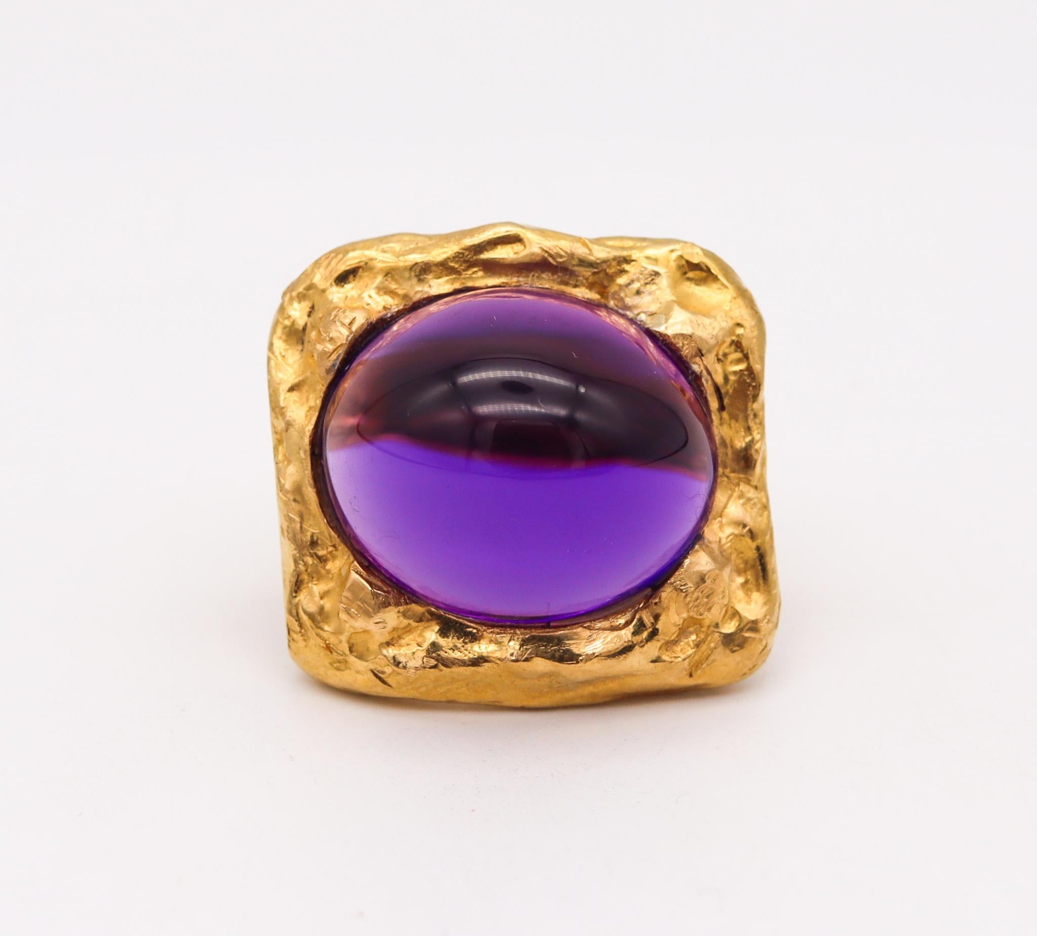Sculptural cocktail ring designed by Jean Mahie.

A very rare piece of wearable art, created in Paris France by the artist, sculptor and goldsmith Jean Mahie, back in the late 1970's. Mahie's rings with color gemstones like this, are very rare and
