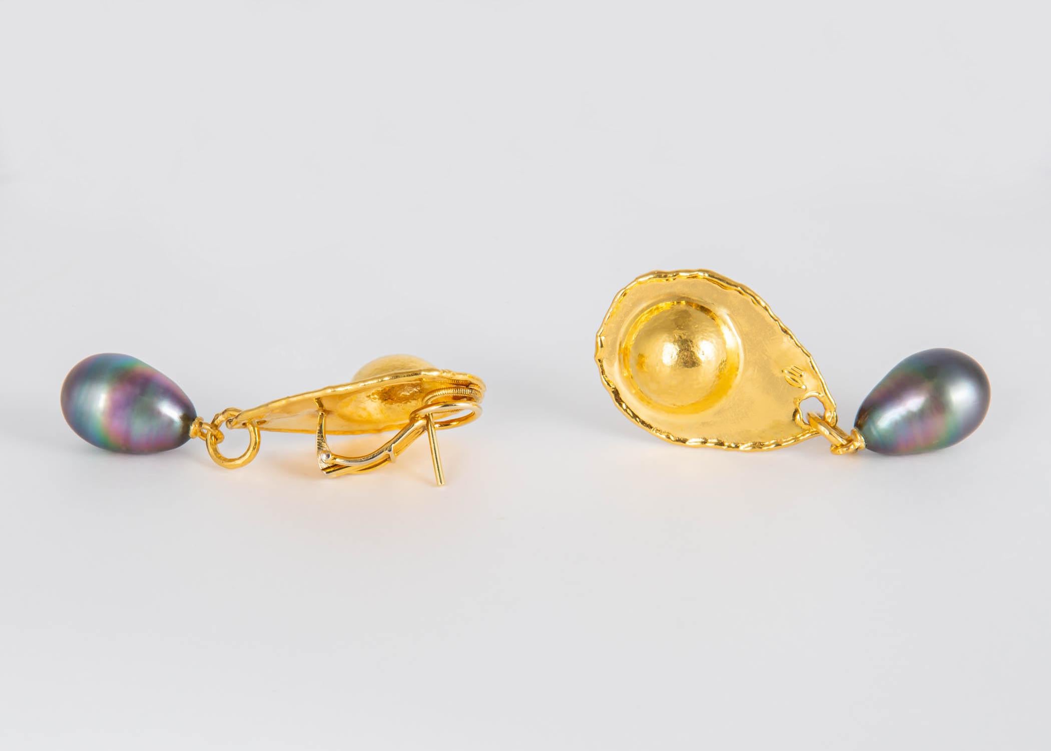 The timeless designs of Jean Mahie are simply wearable art. Rich 22k gold is handwrought  into this dramatic shape and paired with gorgeous Tahitian pearls ( 16 x 11mm )  A totally chic earring !!! 2 inches in length.