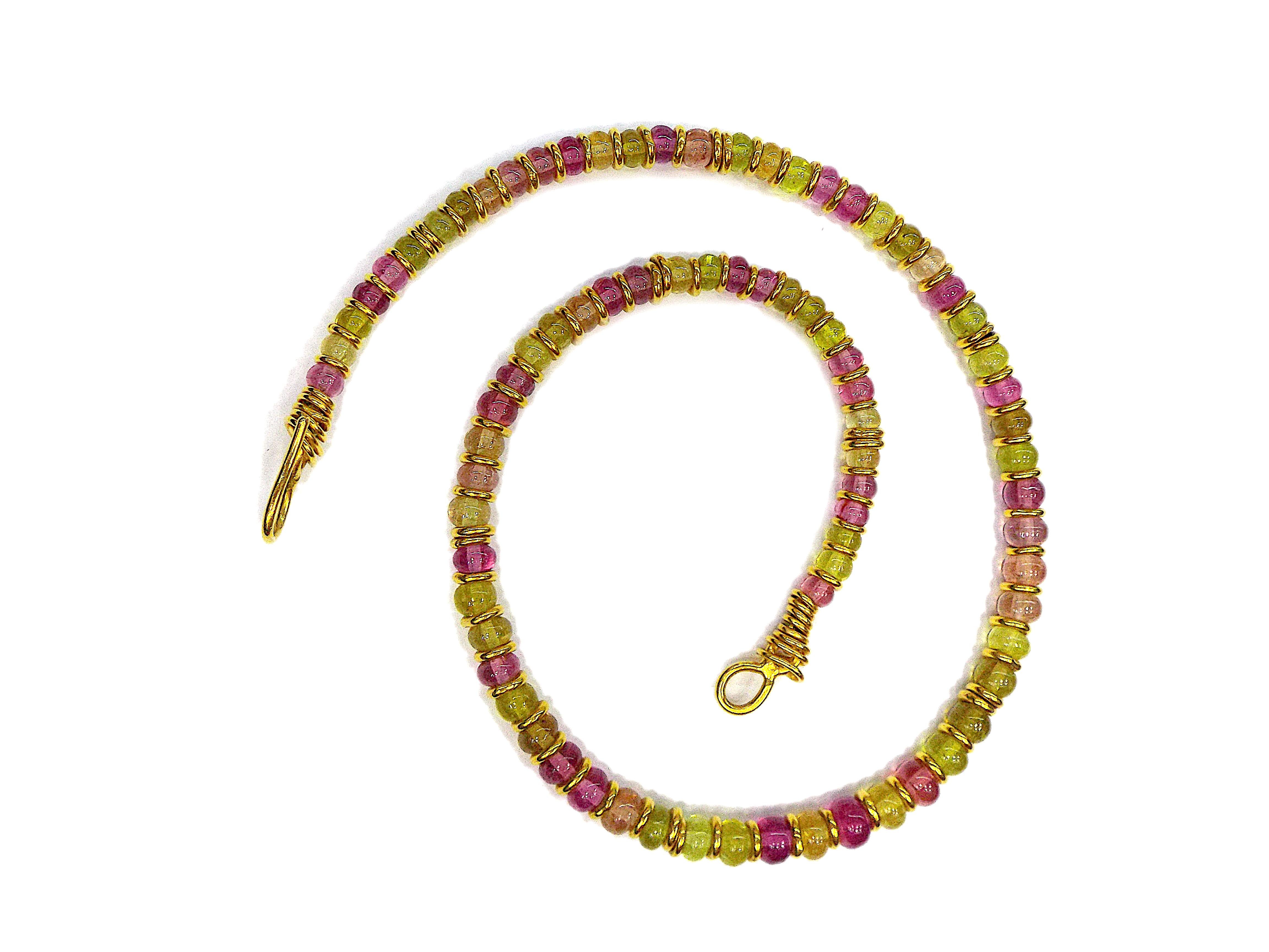 A vibrant and artistic handmade pendant necklace by Jean Mahie. The beaded chain from Bayadere collection is made of 22K yellow gold and amethyst, peridot, beryl beads. The necklace length is 17