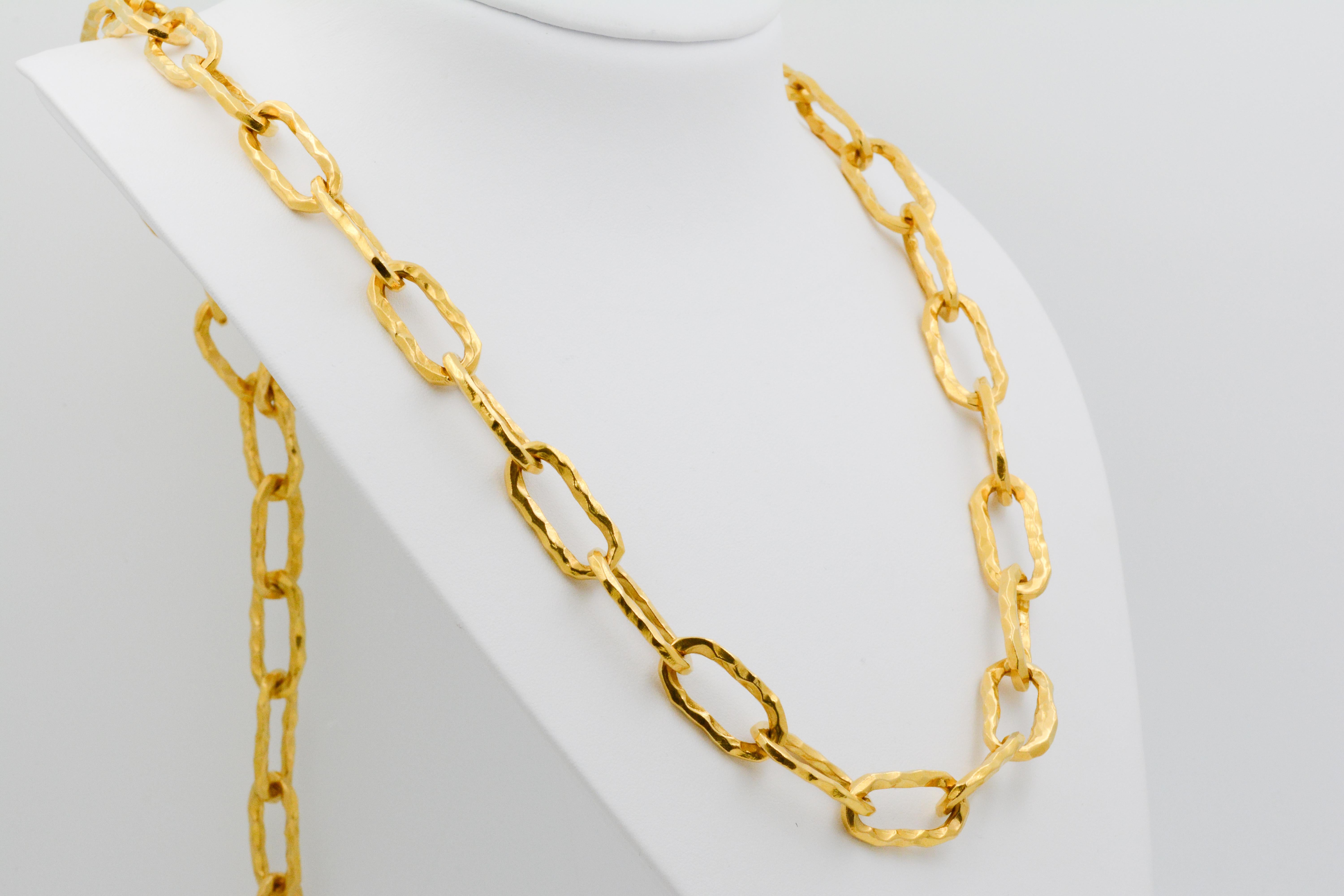 This signed Jean Mahie Cadene 22k yellow gold necklace is 32” long and its heaviness showcases its decadence. 