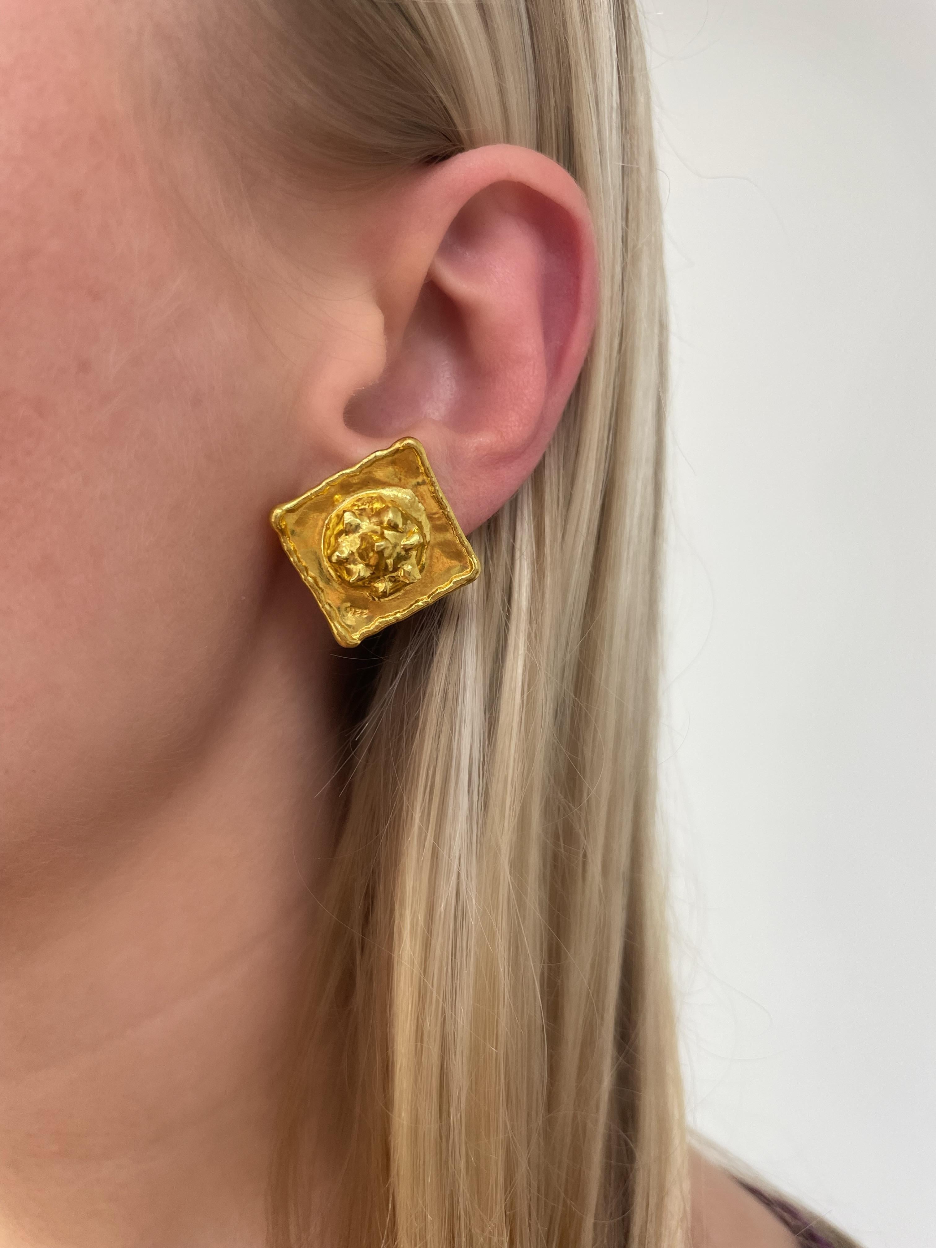 These fun and modern earrings by designer Jean Mahie, a father-in-law and daughter duet, are handmade in France with amazing attention to detail. Created in a diamond shape with central domed form with triangular spike design, these 22 karat gold
