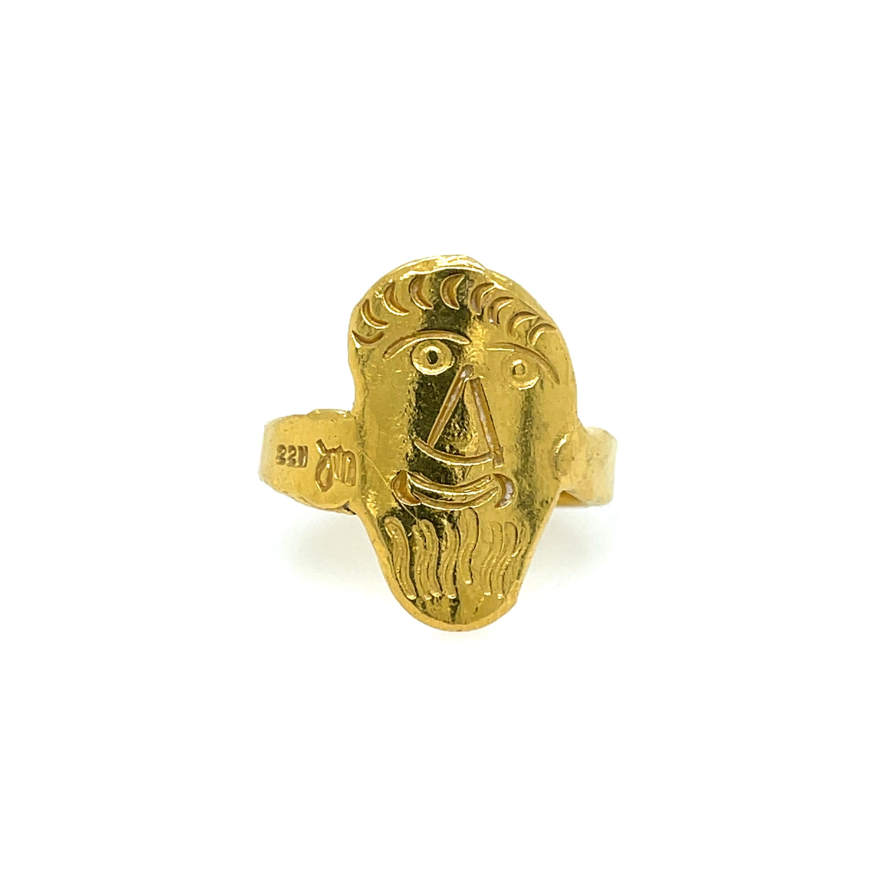 Estate Jean Mahie 22K Yellow Gold Face Ring. The ring portrays a kind smiling face.
Ring size 7.5
12.80 grams