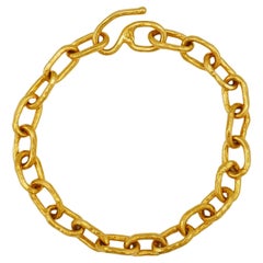 Ovales Gliederarmband von Jean Mahie aus gehämmertem Gold